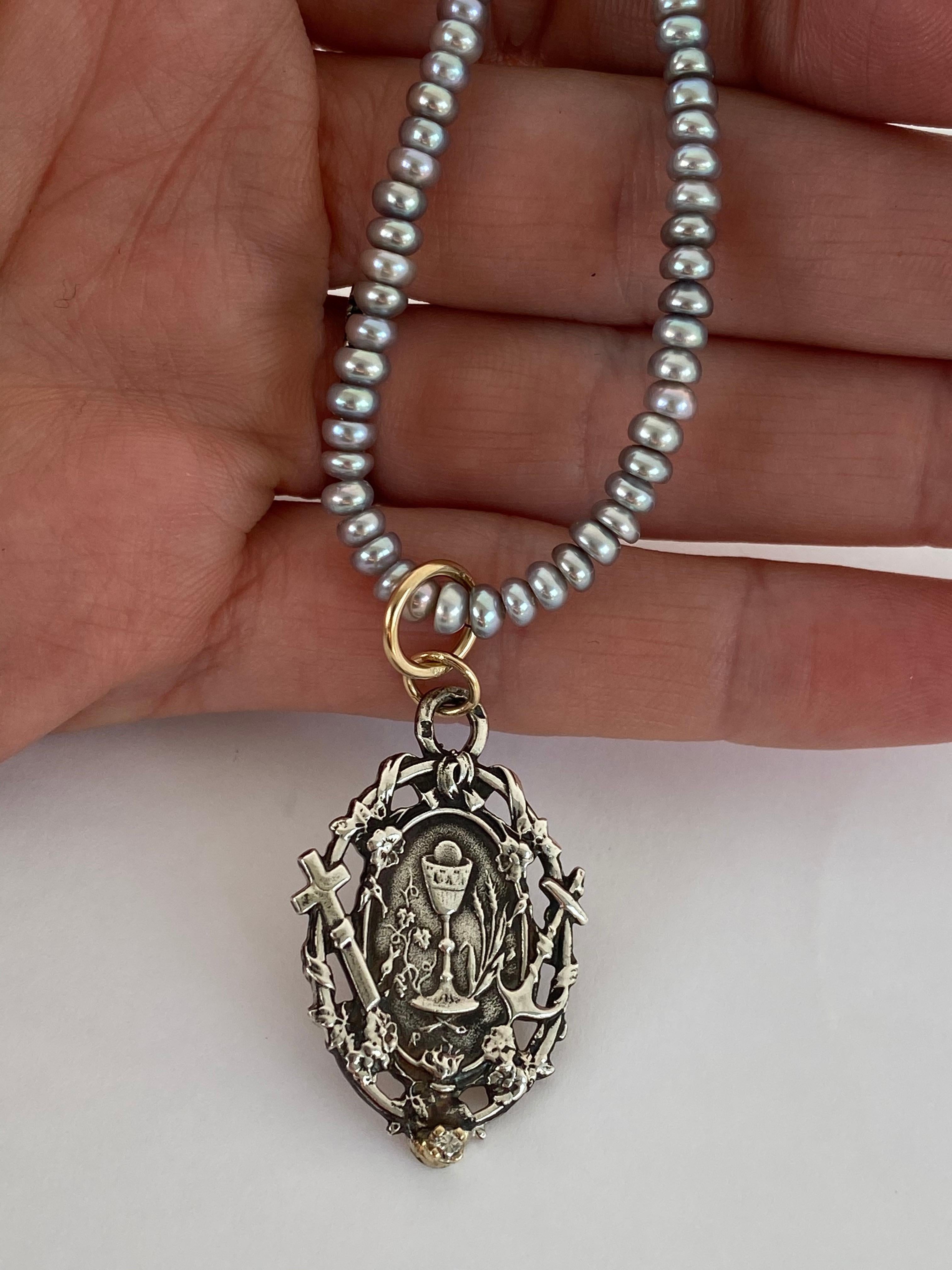 Medal Faith Hope Love White Diamond Pearl Chain Necklace Chrysoprase J Dauphin

Symbols or medals can become a powerful tool in our arsenal for the spiritual. 
Since ancient times spiritual pendants, religious medals has been used to protect us.