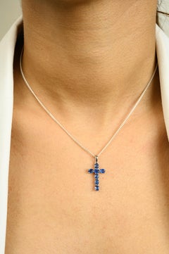 Faith Inspired 14 Karat Solid White Gold Cross Pendant with Blue Sapphire Accent
