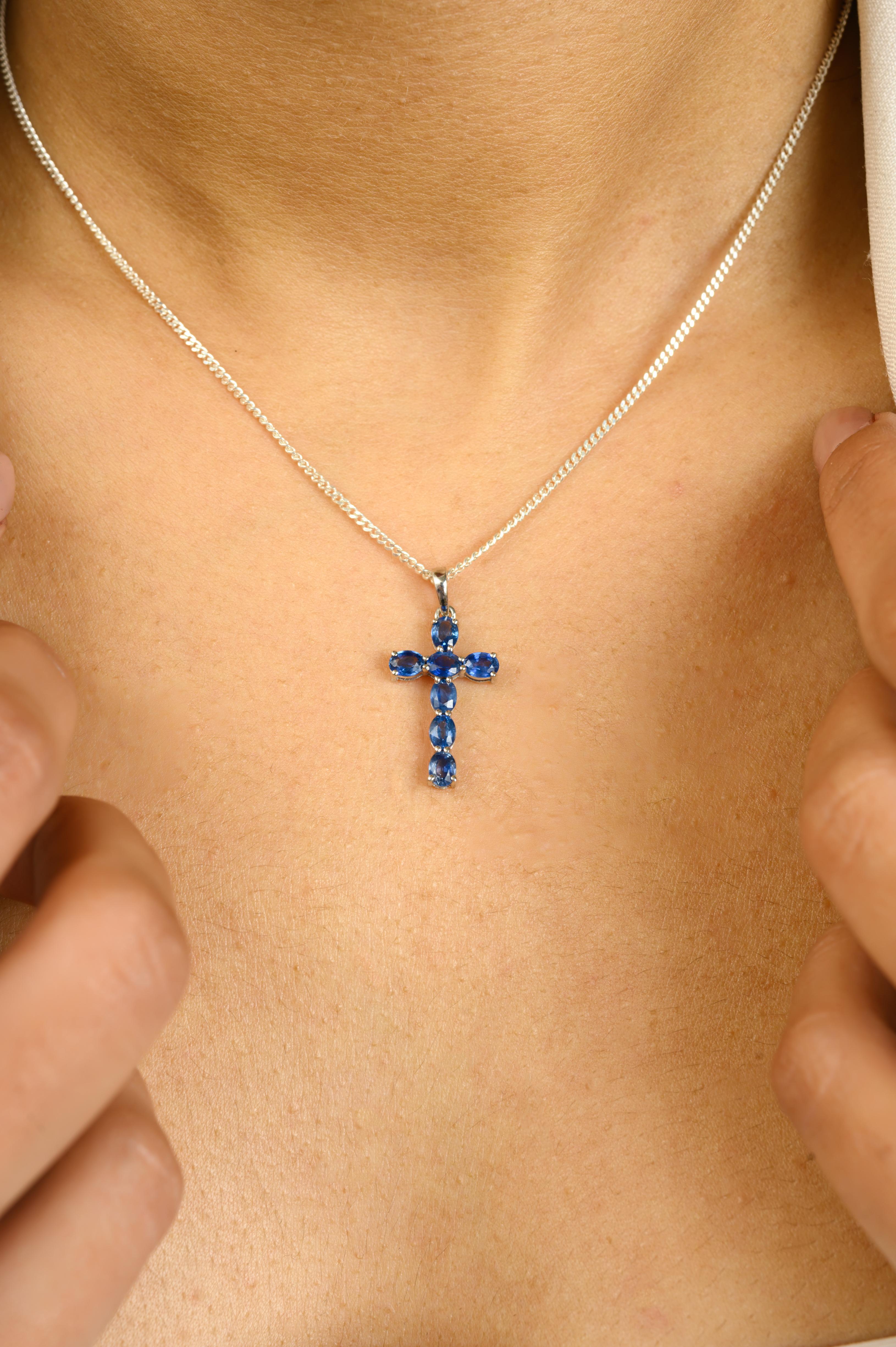 Modernist Faith Inspired 14 Karat Solid White Gold Cross Pendant with Blue Sapphire Accent For Sale