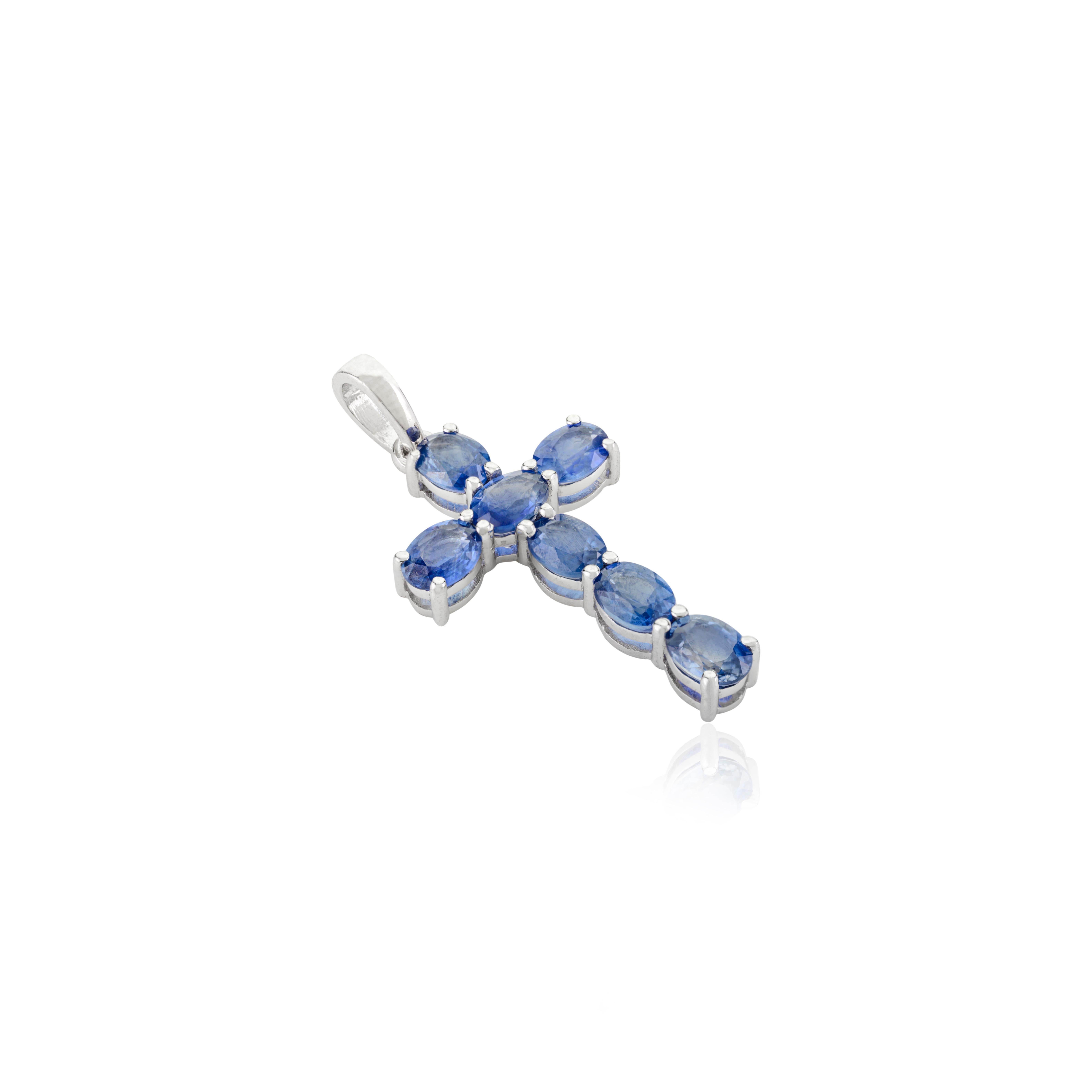Women's Faith Inspired 14 Karat Solid White Gold Cross Pendant with Blue Sapphire Accent For Sale