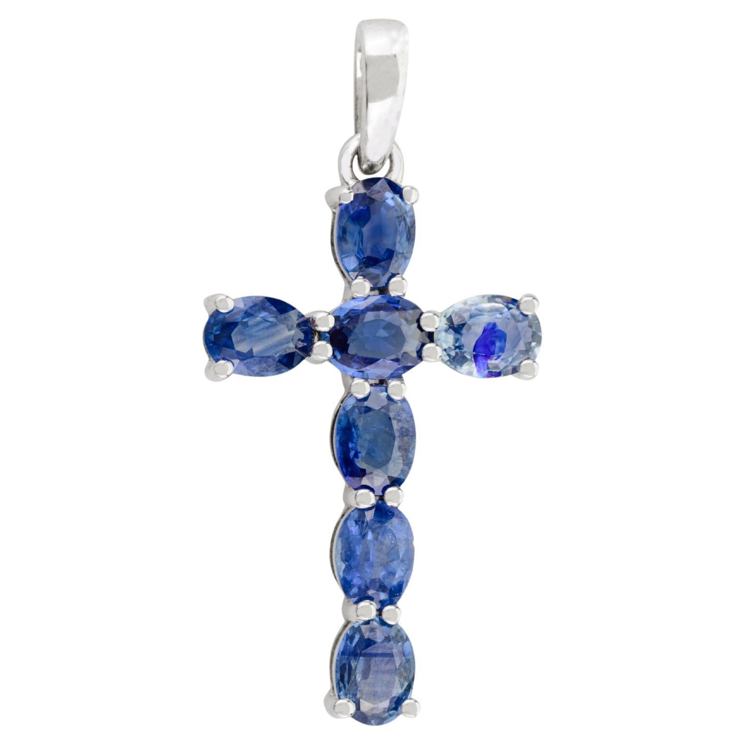 Faith Inspired 14 Karat Solid White Gold Cross Pendant with Blue Sapphire Accent For Sale