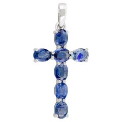 Pendentif croix inspiré de la foi en or blanc massif 14 carats avec détails en saphir bleu
