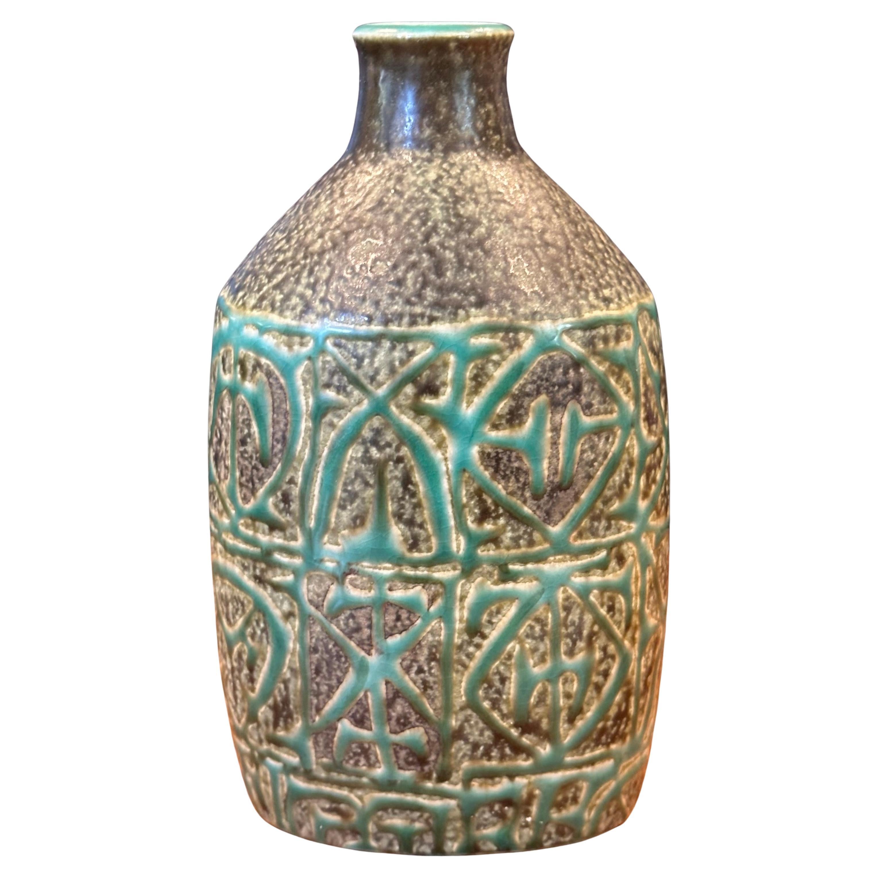 Wonderful Fajance lidded box / canister and vase from the Baca line by Nils Thorsson for Royal Copenhagen, circa 1960s. The stunning green and black glazed stoneware pieces with geometric abstract design were designed by Royal Copenhagen's renowned
