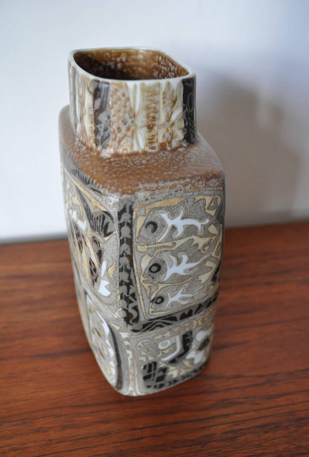 Baca fajance/ceramic vase designed by Nils Thorsson (1989-1975) and produced in 1960s at Royal Copenhagen, Denmark. 
Complexed and detailed patterns which in creation from Scandinavia have become Mid Century iconic fajance. 
Stamped with Nils