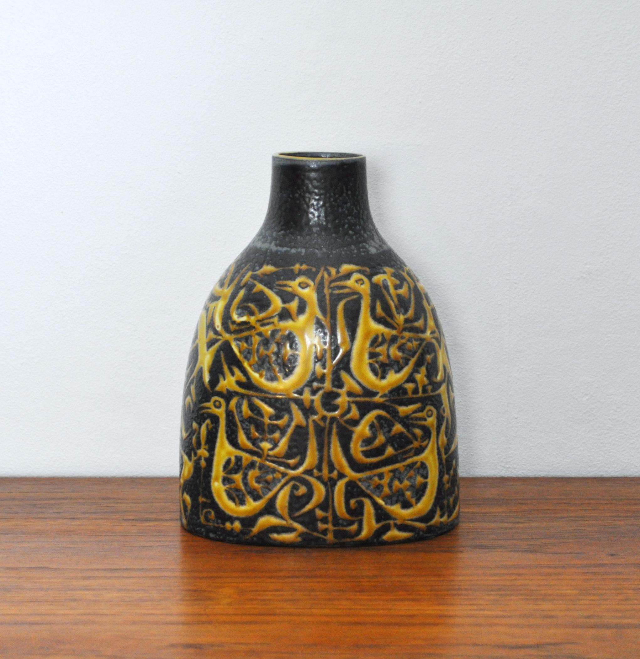 Baca fajance/ceramic vase designed by Nils Thorsson (1989-1975) and produced from 1965 at Royal Copenhagen, Denmark. 
Complexed and detailed patterns which in creation from Scandinavia have become mid-century iconic fajance. The glaze is matte and