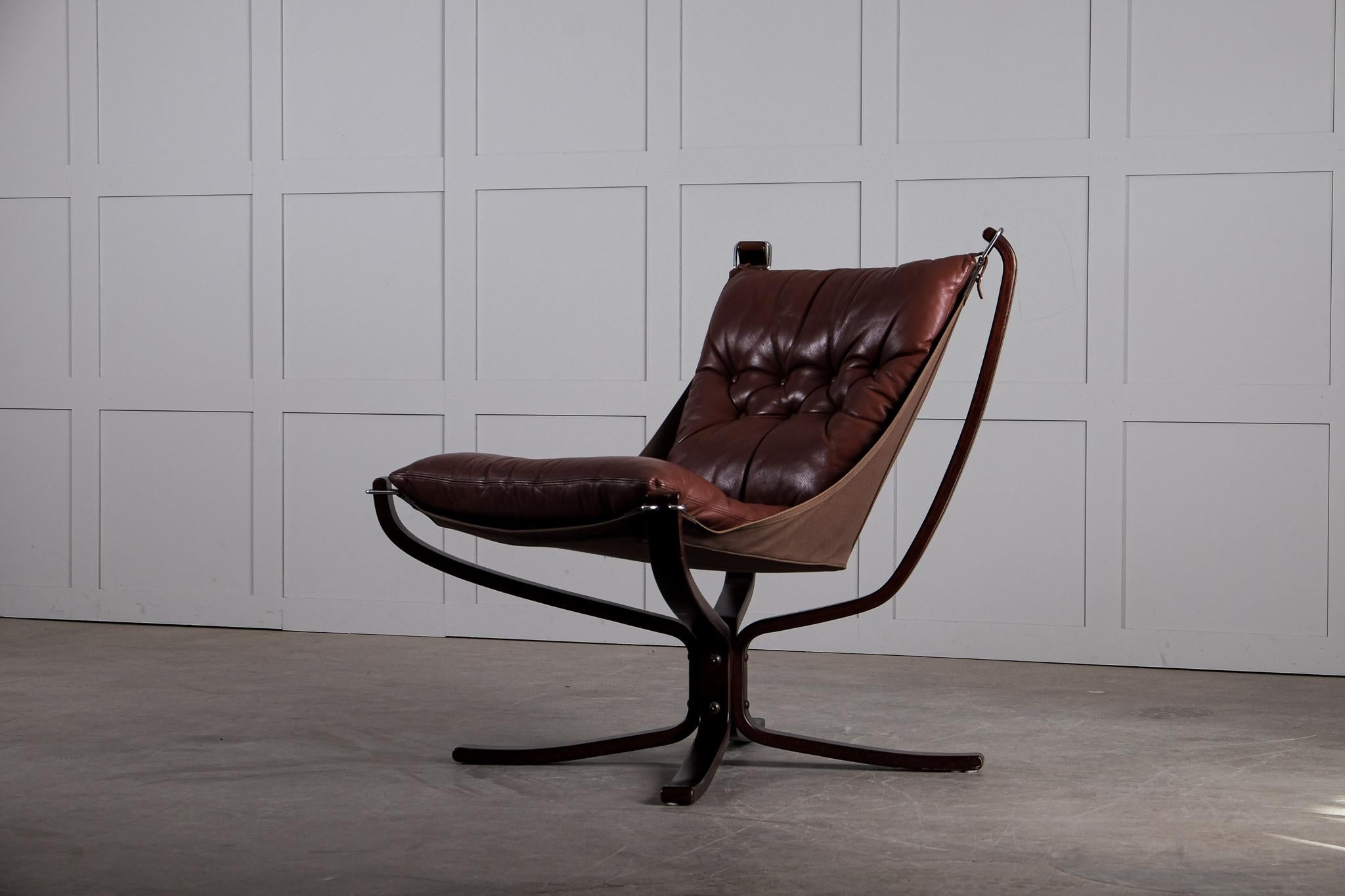 Norwegian Falcon chair in brown leather by Sigurd Ressel, Norway, 1970s. Very good vintage condition with signs of usage and patina.
 