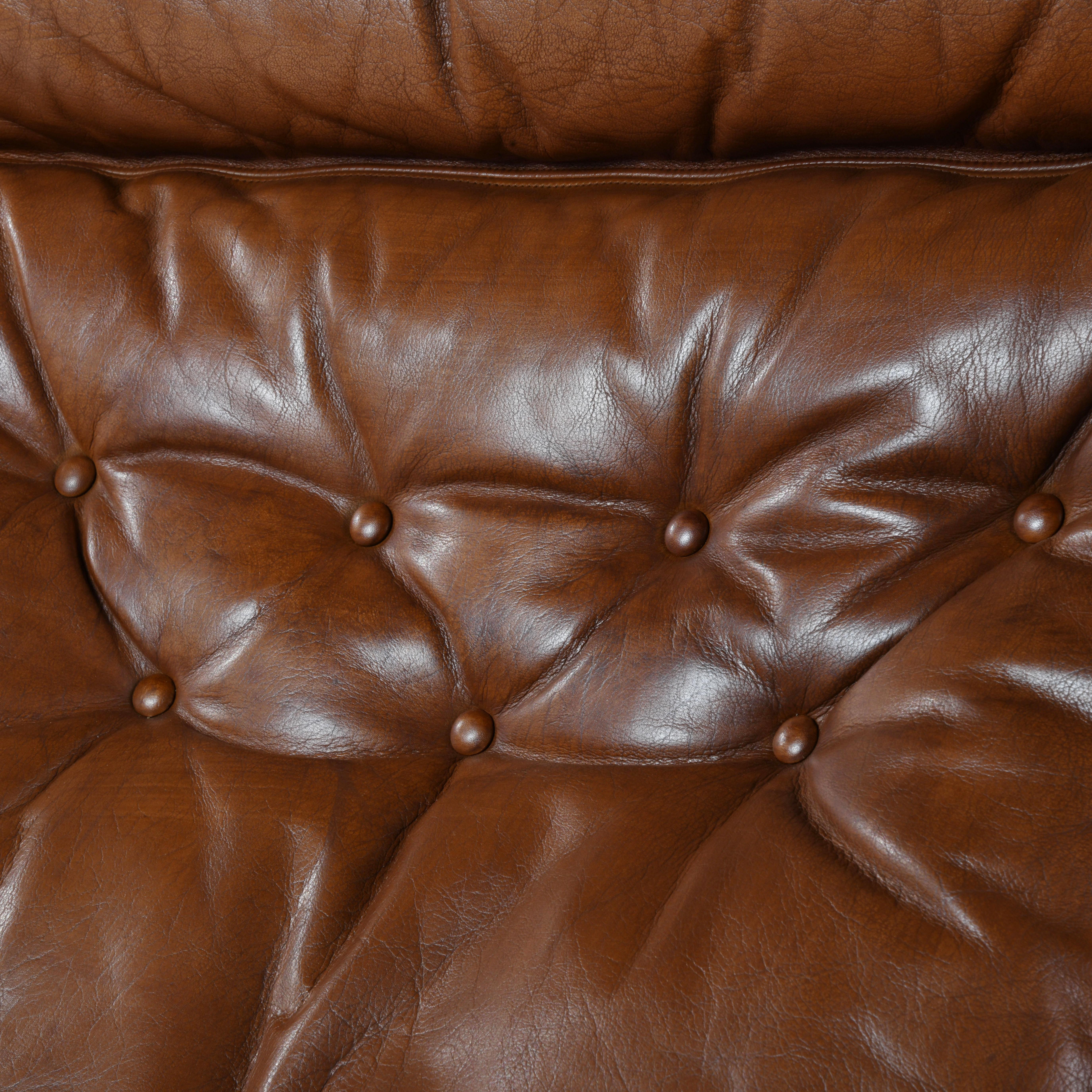 Falcon chair, design Sigurd Ressell, wood and brown leather version 3
