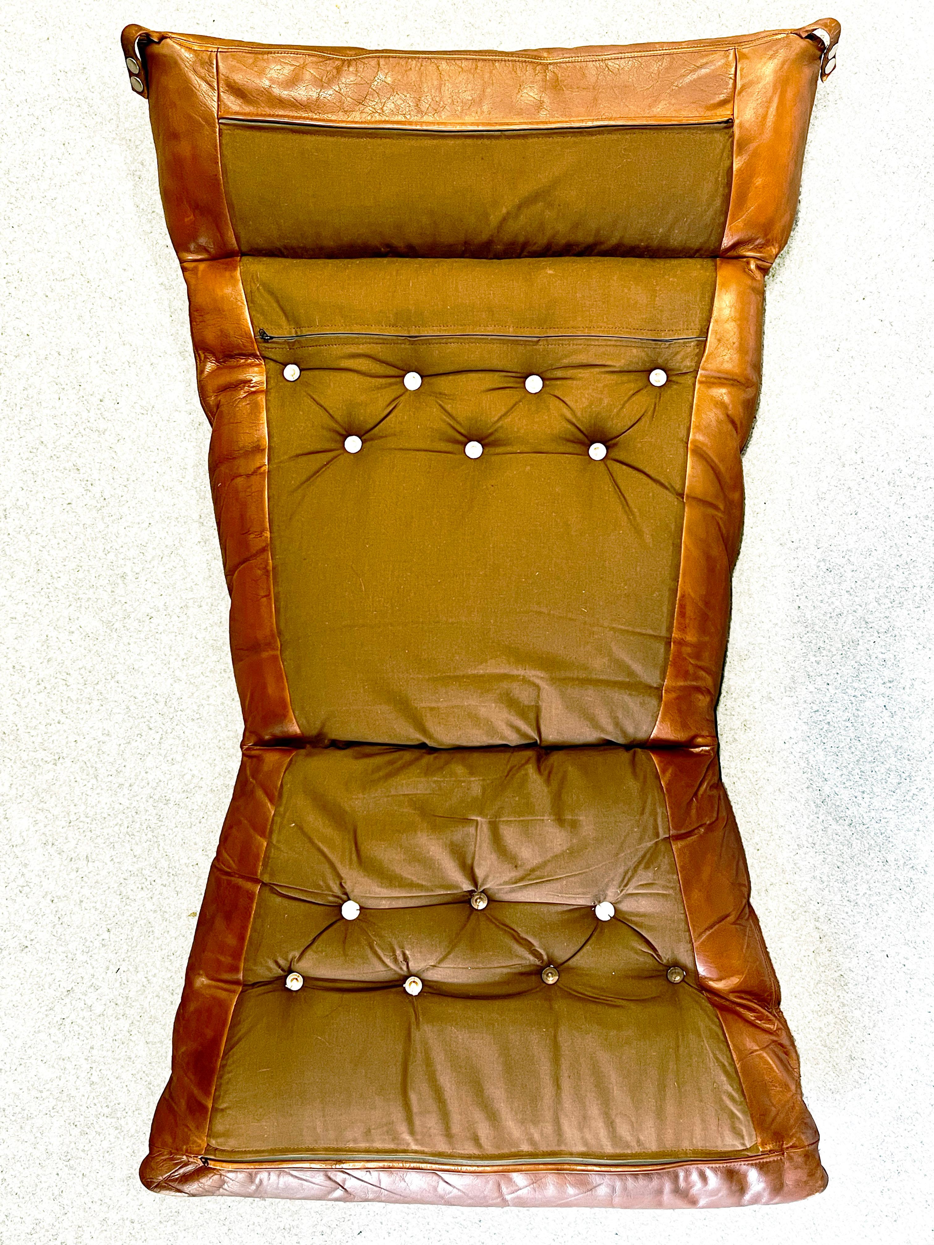 Falcon chair, design Sigurd Ressell, wood and brown leather version 7
