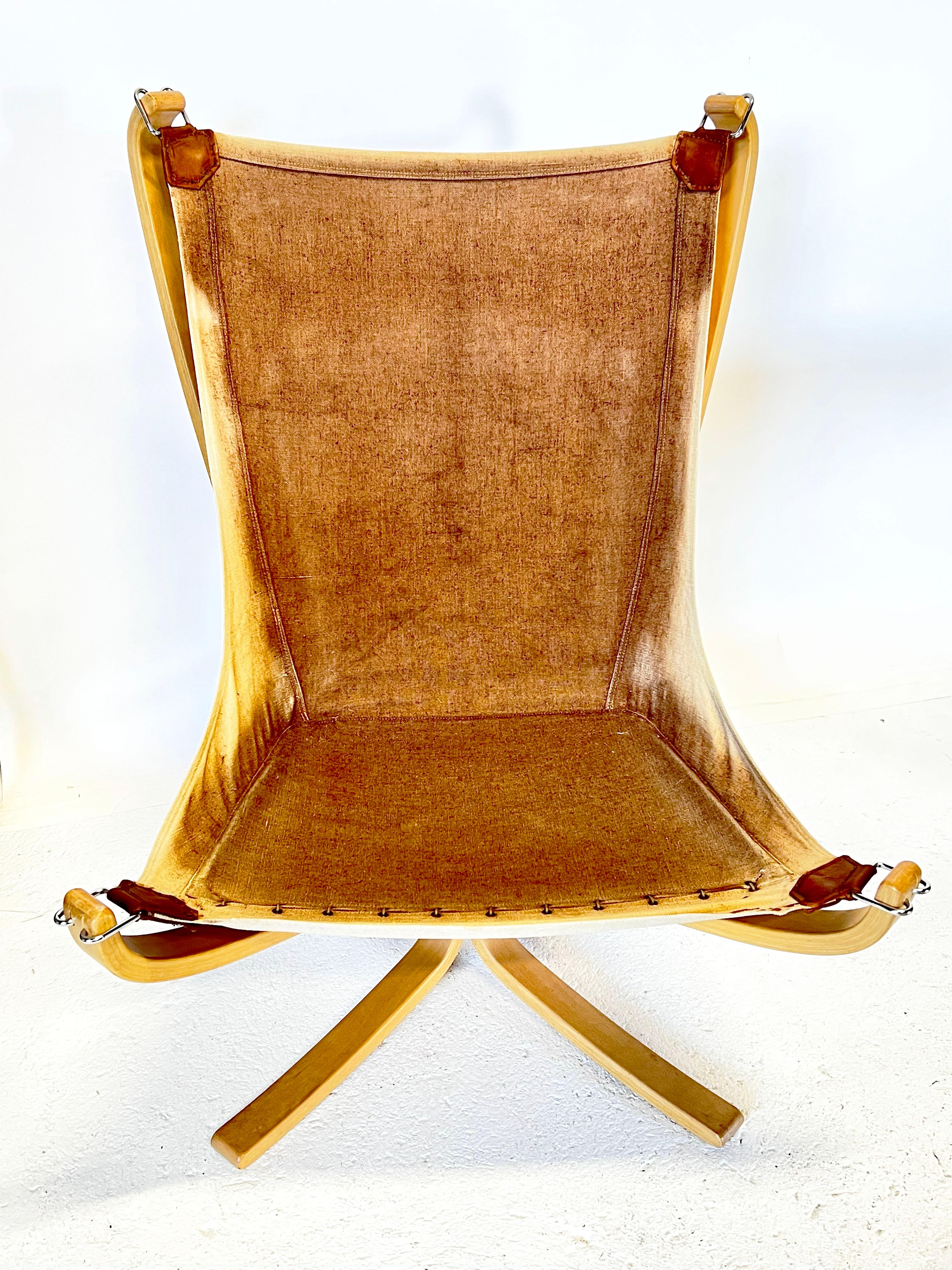 Falcon chair, design Sigurd Ressell, wood and brown leather version 11