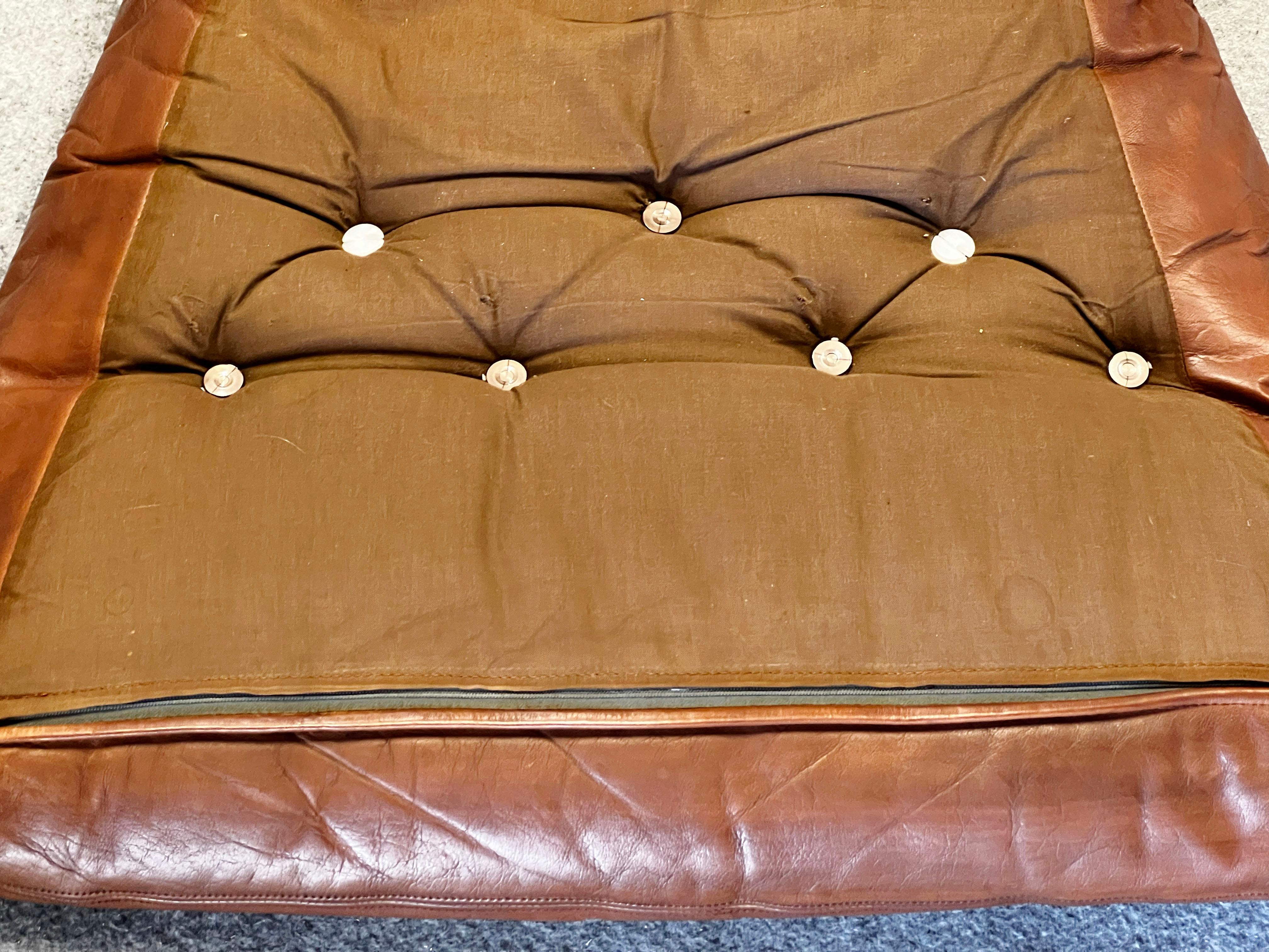Falcon chair, design Sigurd Ressell, wood and brown leather version 12