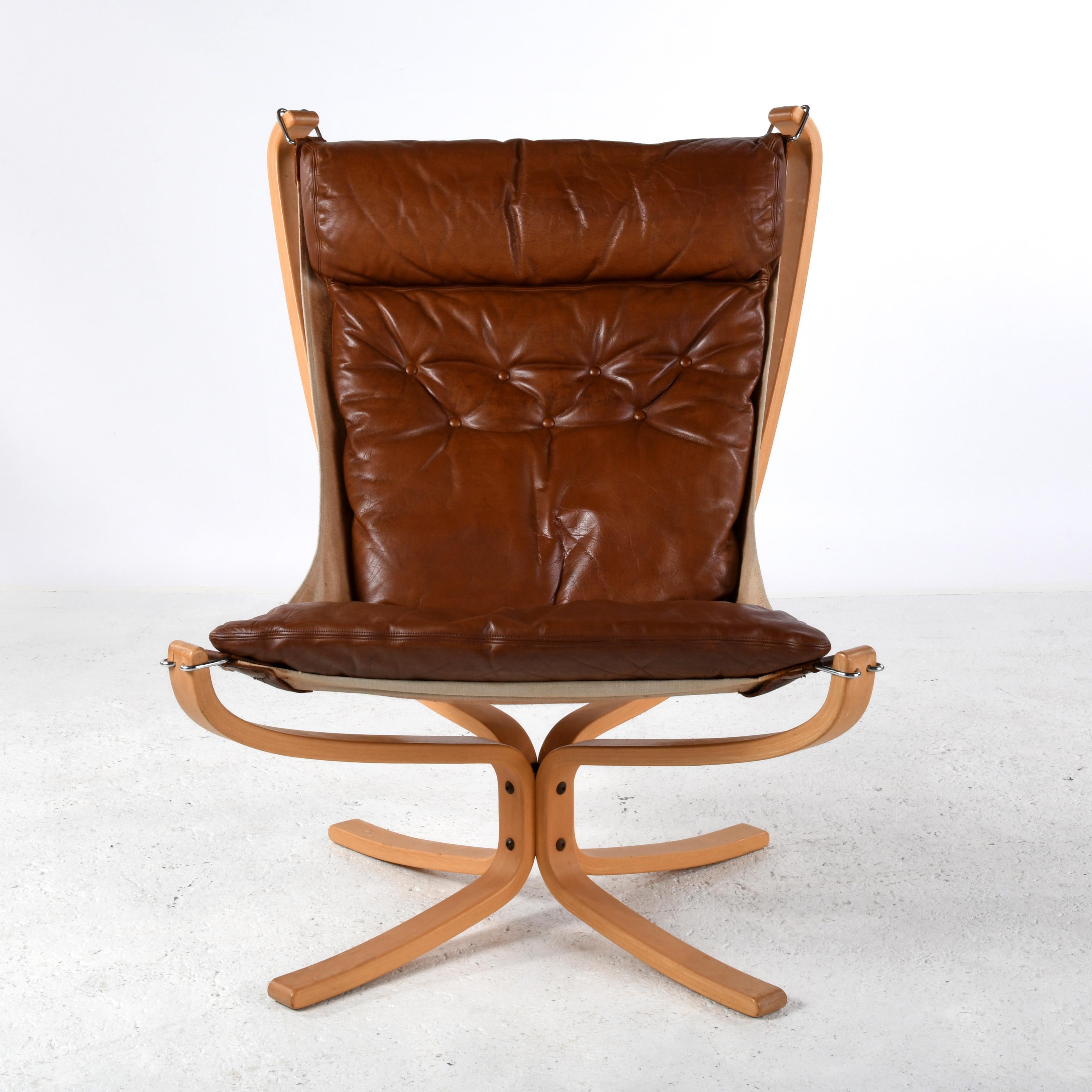 Scandinavian Modern Falcon chair, design Sigurd Ressell, wood and brown leather version