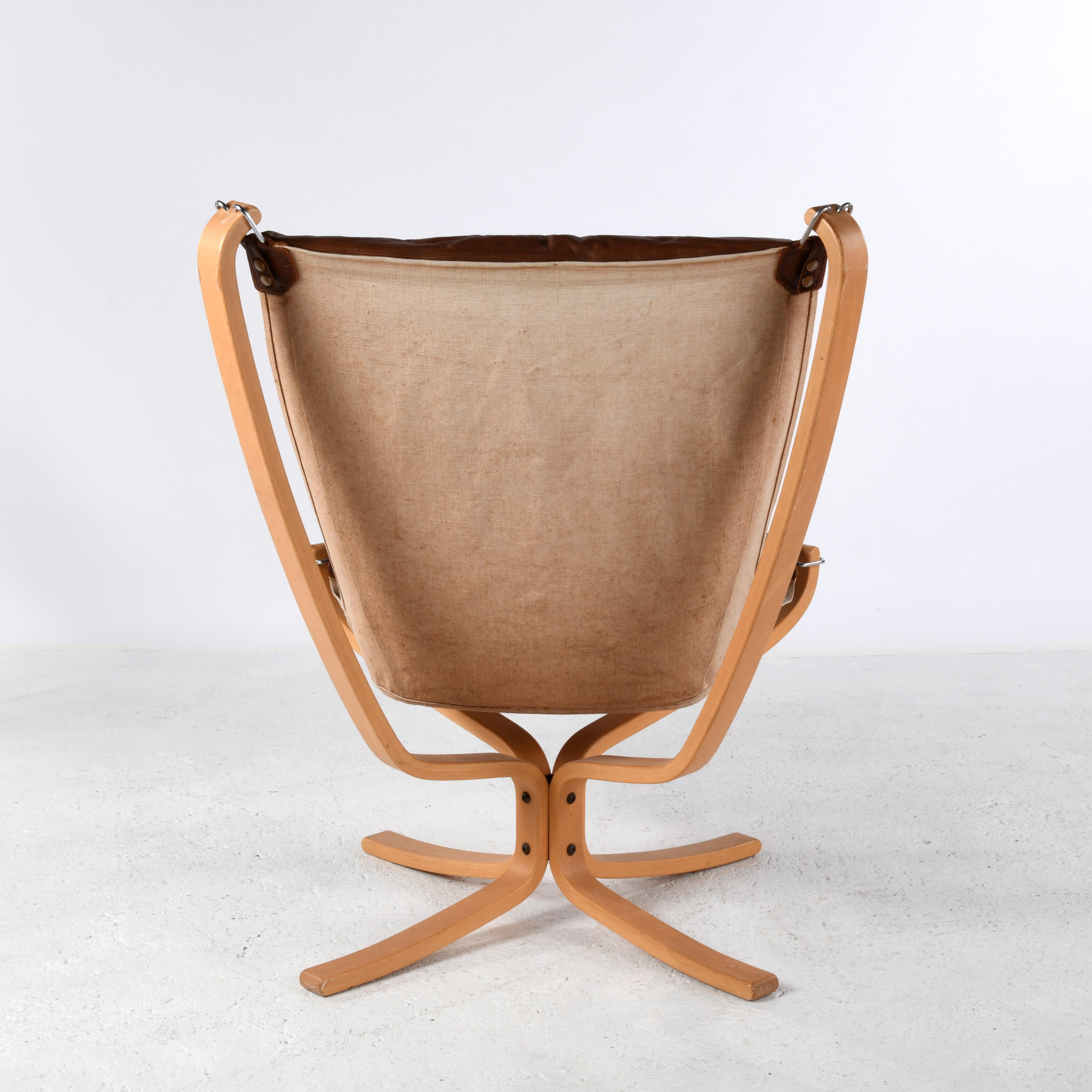 Scandinavian Modern Falcon chair, design Sigurd Ressell, wood and brown leather version