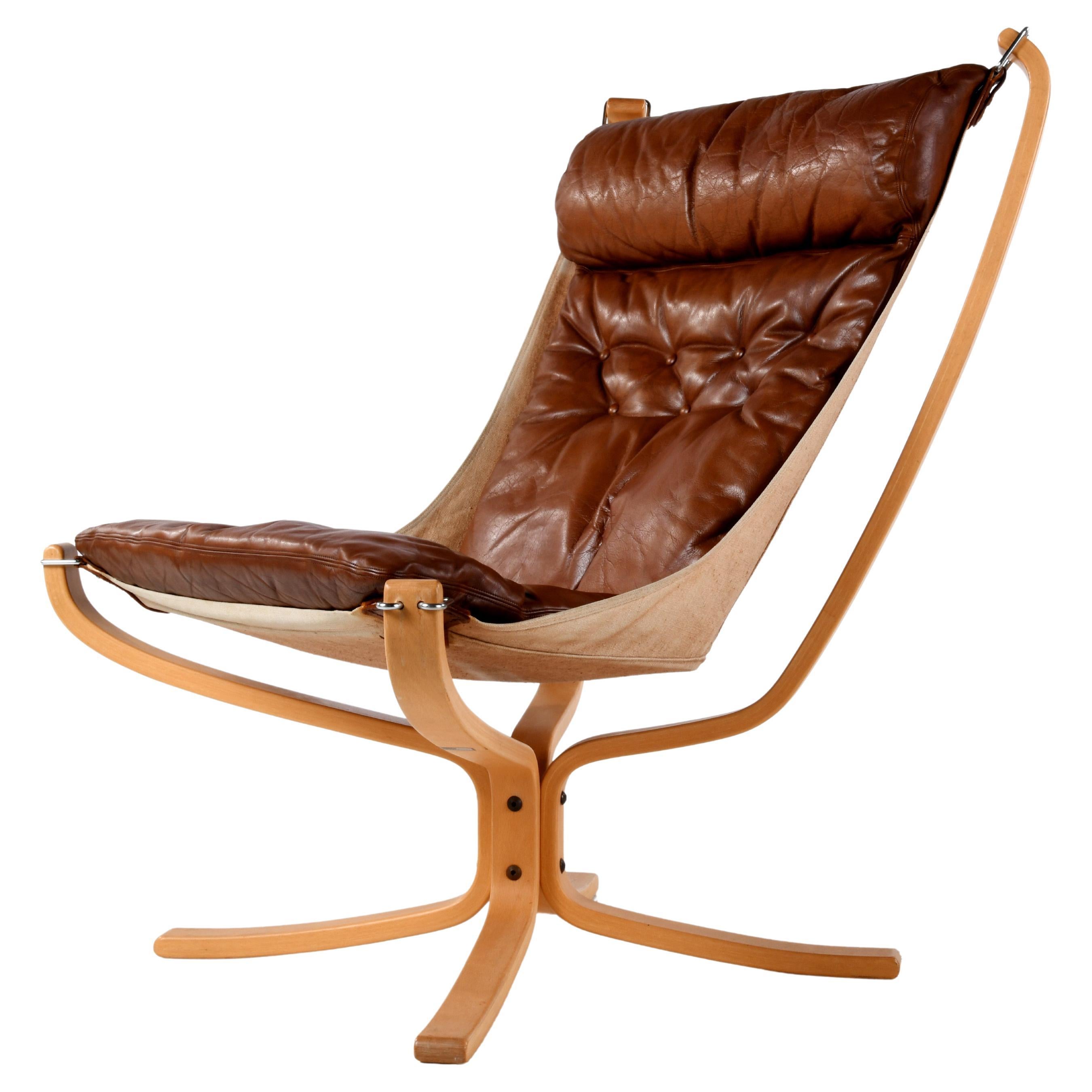 Falcon chair, design Sigurd Ressell, wood and brown leather version For Sale