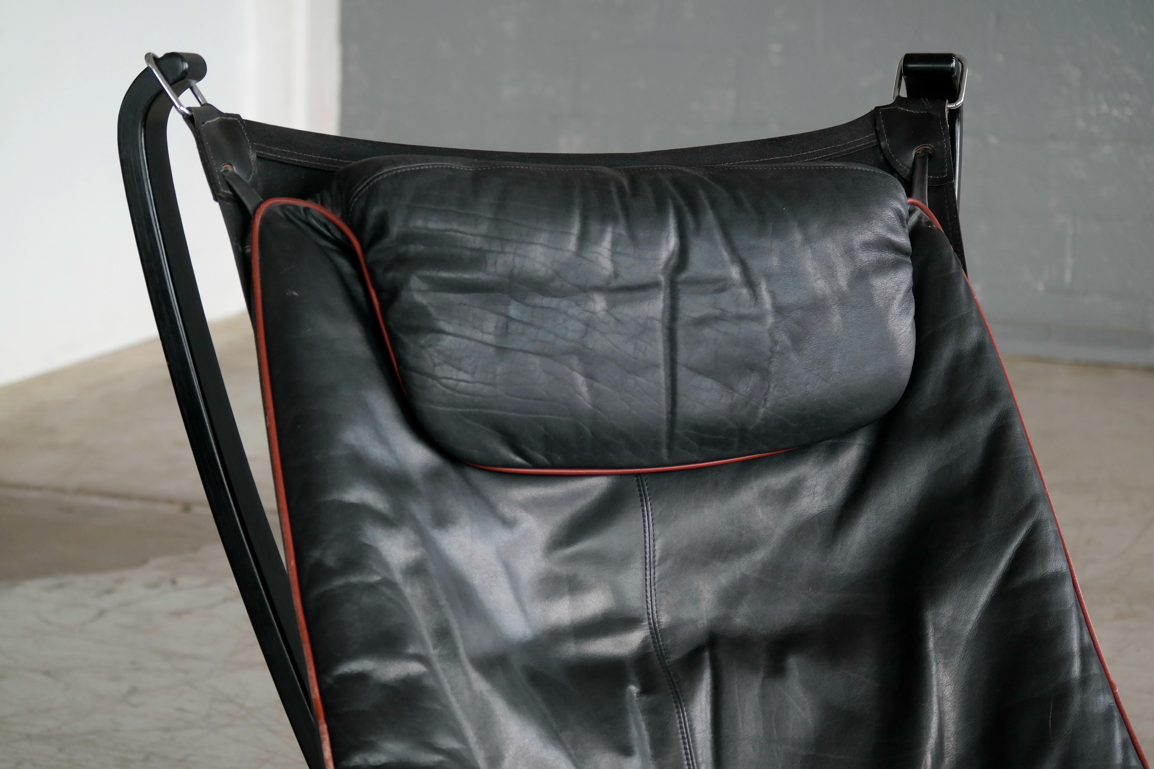 Norwegian Falcon Lounge Chair with Ottoman in Black Leather Red Piping by Resell
