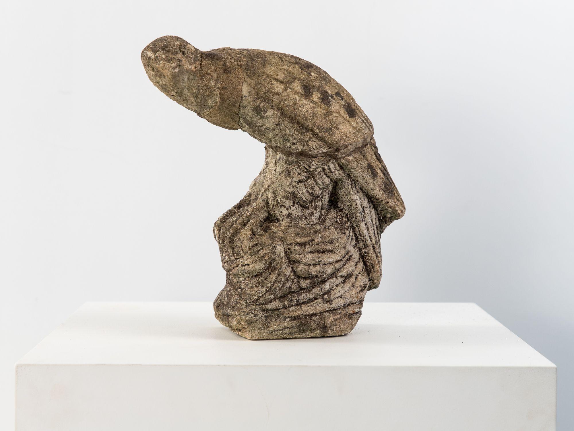 With its weathered stone finish and patina, this regal Belgian Mid 20th Century hawk or falcon exudes quiet strength and vigilance. The subtle detailing and noble stance evoke a sense of watchfulness, as if standing guard over the garden. Hawks have