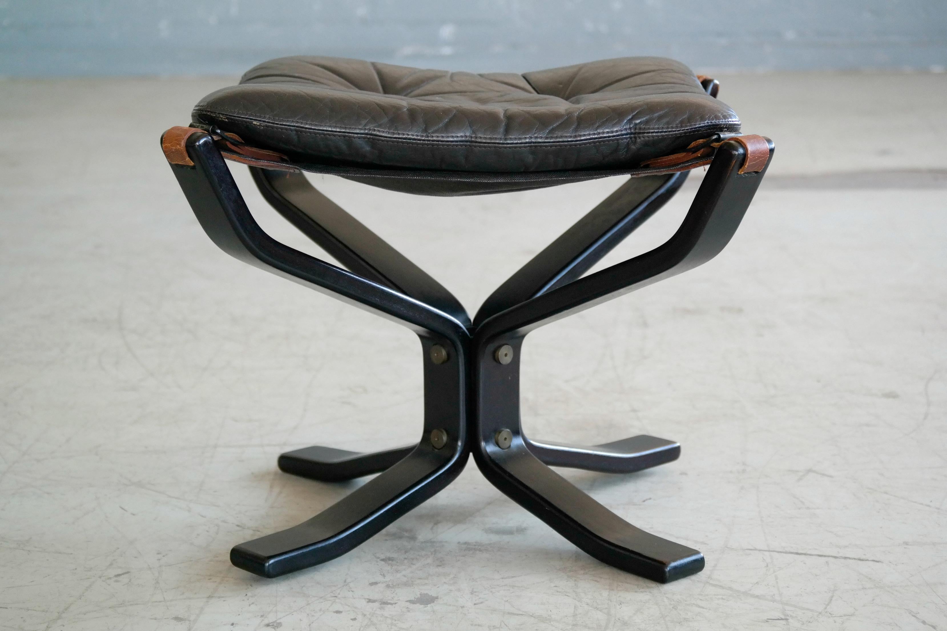 black leather footstool
