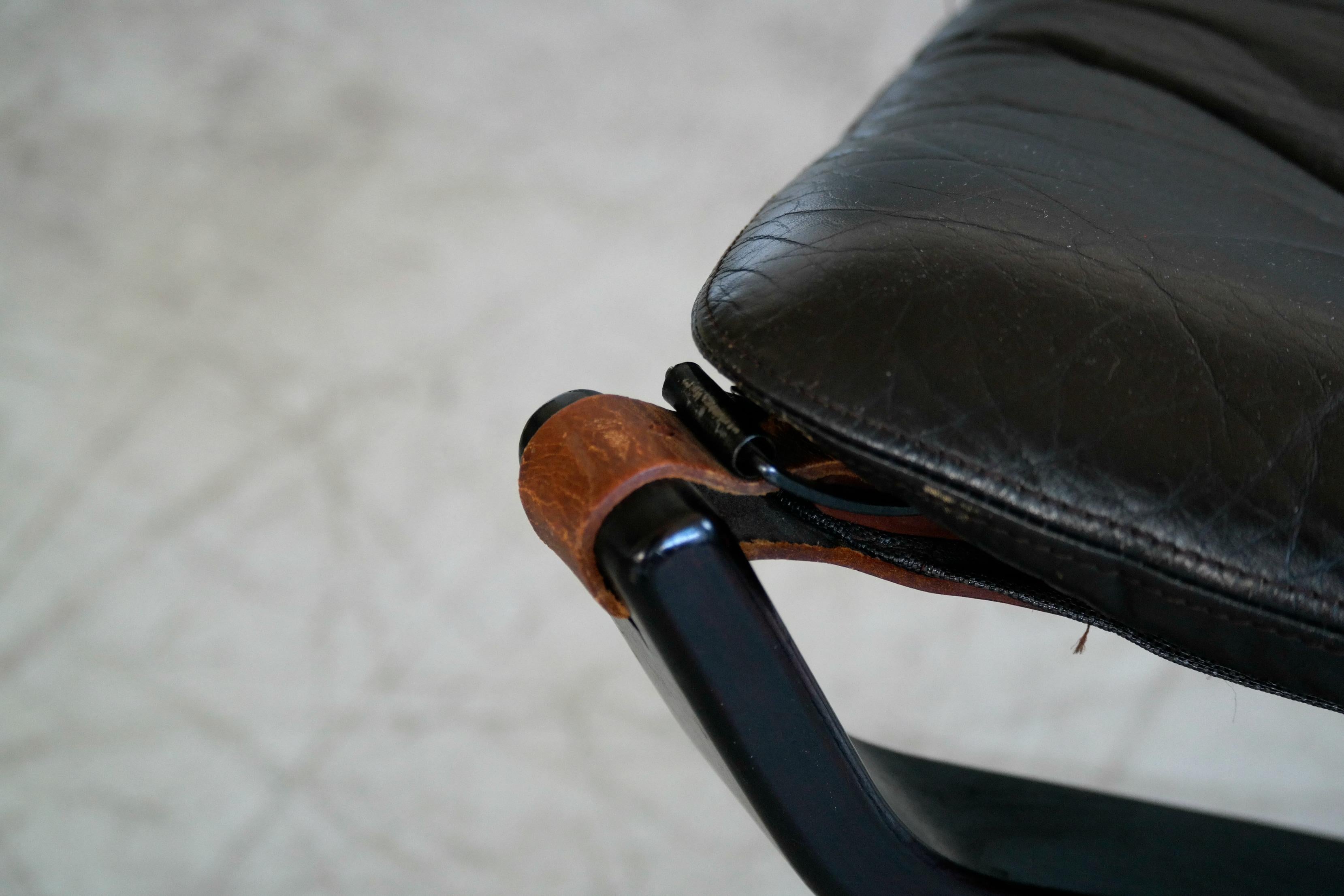 Mid-Century Modern Falcon Ottoman or Footstool by Sigurd Ressell in Dark Wood and Black Leather