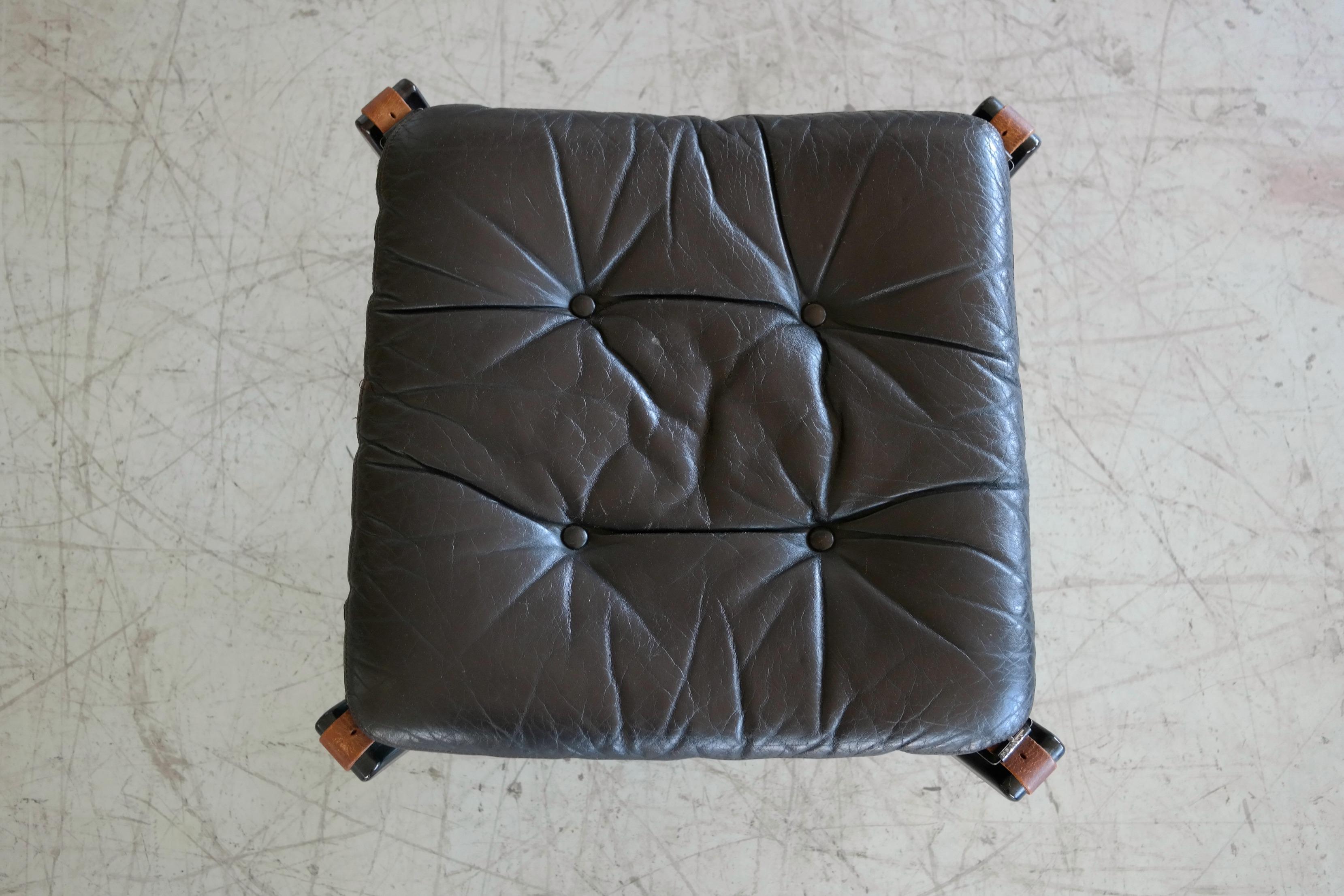 Norwegian Falcon Ottoman or Footstool by Sigurd Ressell in Dark Wood and Black Leather