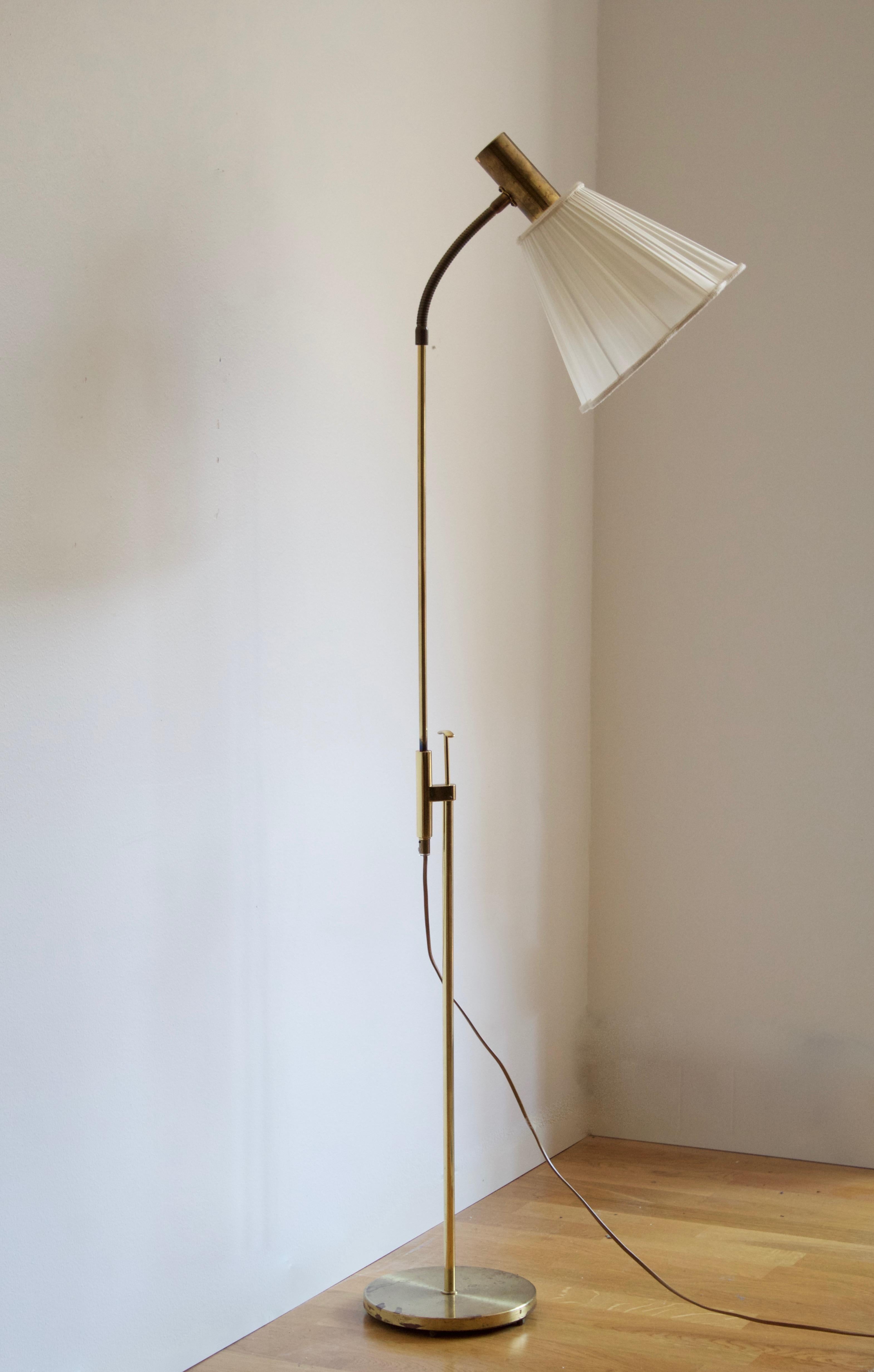 An adjustable floor lamp. Produced by Falkenbergs Belysning. Stamped

Other designers of the period include Hans Bergström, Hans-Agne Jacobson, Alvar Aalto, Josef Frank, and Paavo Tynell.