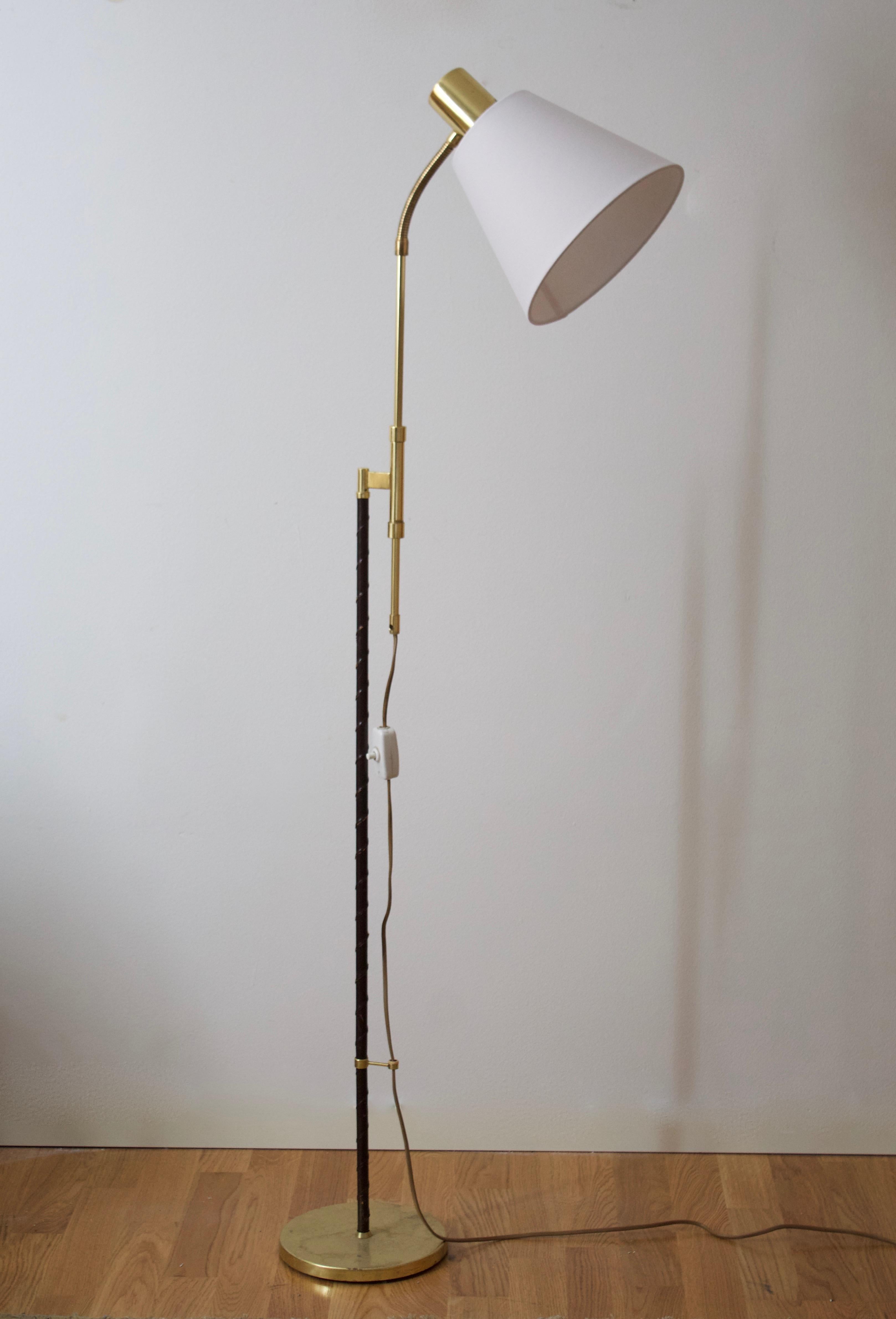 An adjustable floor lamp. Produced by Falkenbergs Belysning. Black leather-wrapped stem.

Other designers of the period include Hans Bergström, Hans-Agne Jacobson, Alvar Aalto, Josef Frank, and Paavo Tynell.