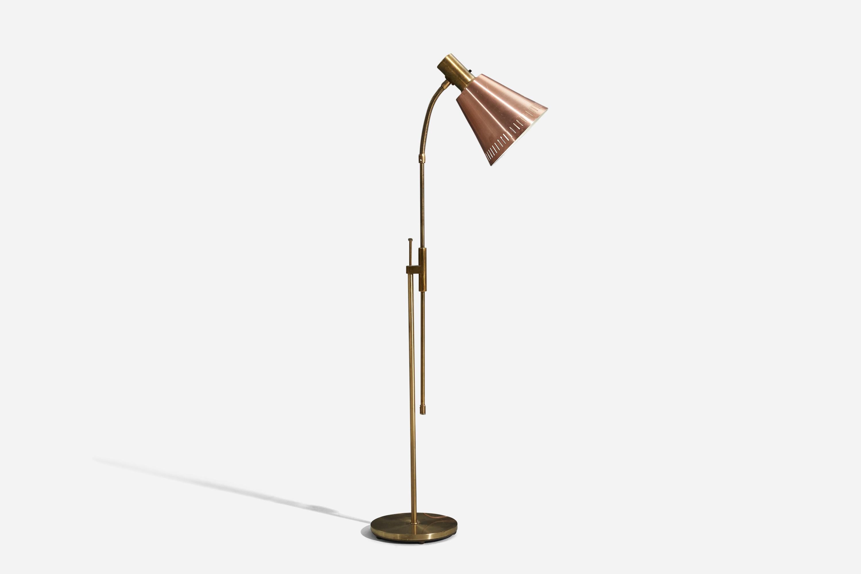 An adjustable, brass floor lamp designed and produced by Falkenbergs Belysning, Sweden, 1950s.

Variable dimensions, measured as illustrated in the first image. 

Sold with lampshade. 
Dimensions stated refer to the floor lamp with the