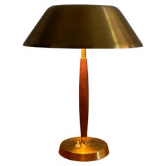 Falkenberg Belysning:: lampe de table fonctionnaliste:: laiton:: bois teinté:: 1950s