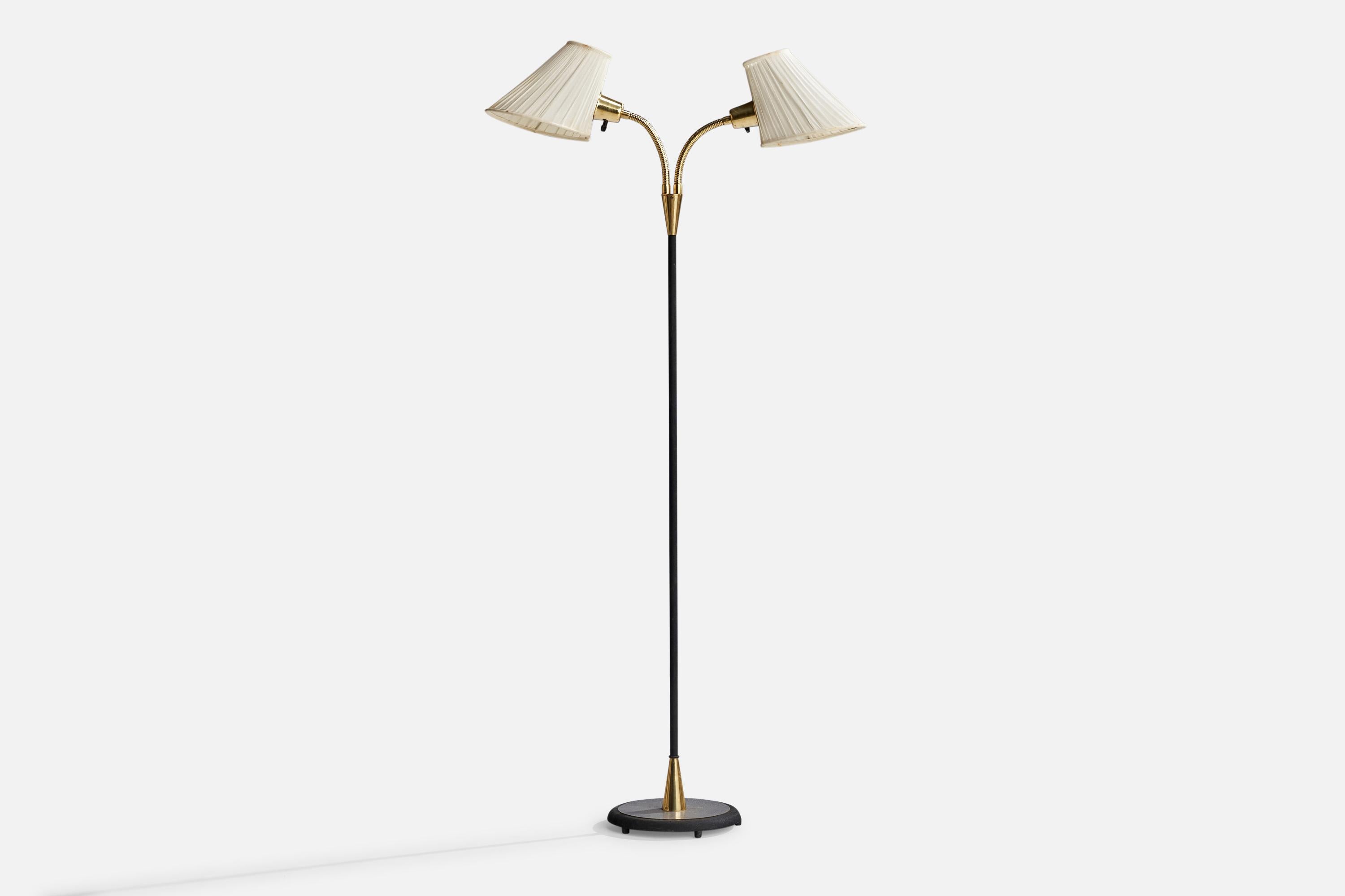 A brass, black-lacquered metal and off-white fabric floor lamp designed and produced by Falkenbergs Belysning, Sweden, 1950s.

Dimensions variable.

Overall Dimensions (inches): 57”  H x 10.25” W x 15” D
Stated dimensions include shade.
Bulb