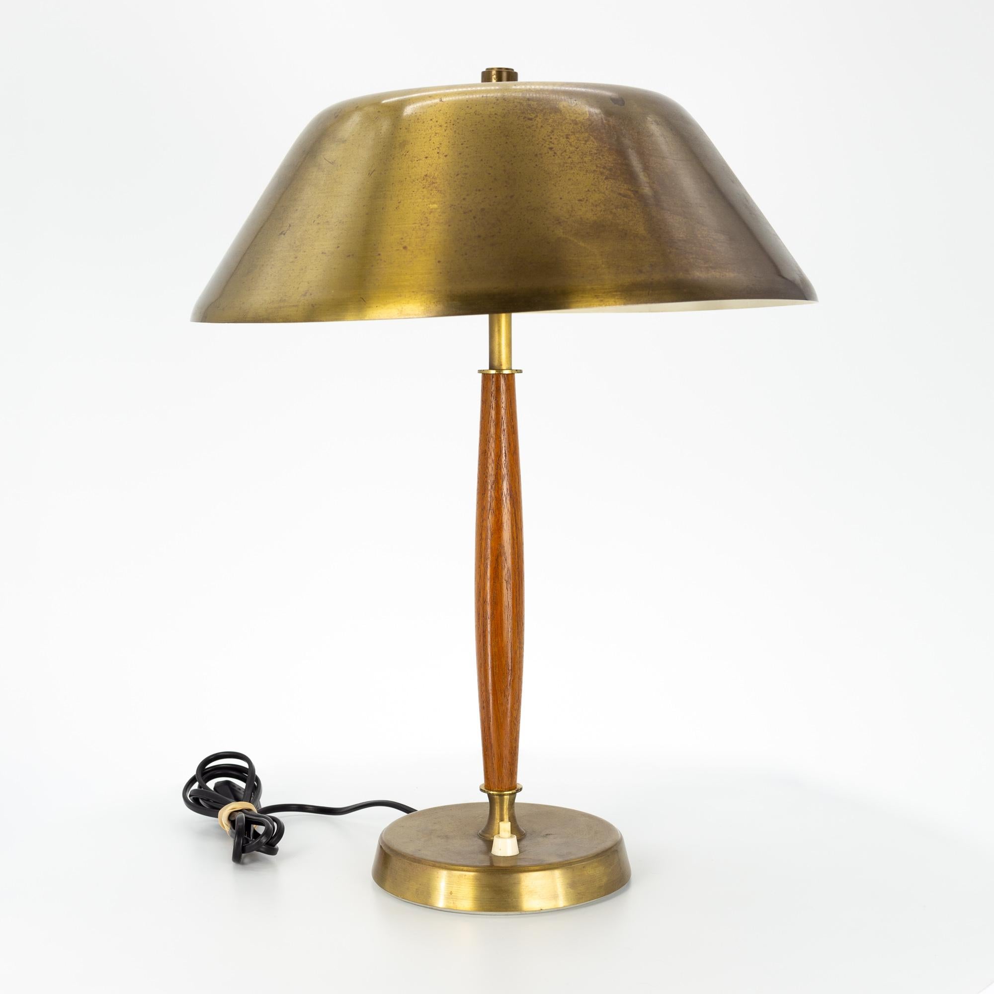 Falkenbergs Belysning mid century brass and walnut table lamp

This lamp measures: 13 wide x 13 deep x 18 inches high

This lamp is in Great Vintage Condition

We take our photos in a controlled lighting studio to show as much detail as