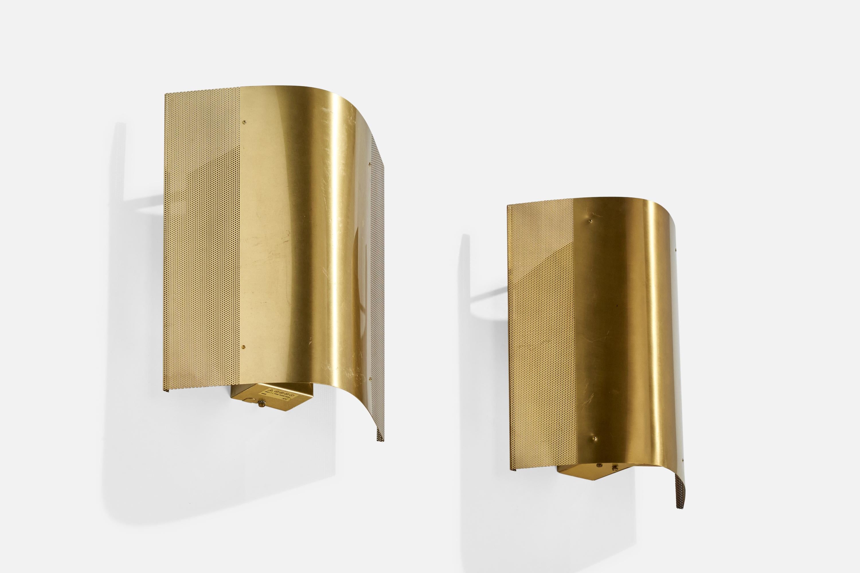 A pair of brass wall lights designed and produced by Falkenbergs Belysning, Sweden, c. 1980s.

Overall Dimensions (inches):  12” H x  10.25” W x  5.125“D
Back Plate Dimensions (Inches):  10.5” H x 2.625” W x 2” D
Bulb Specifications: E-26