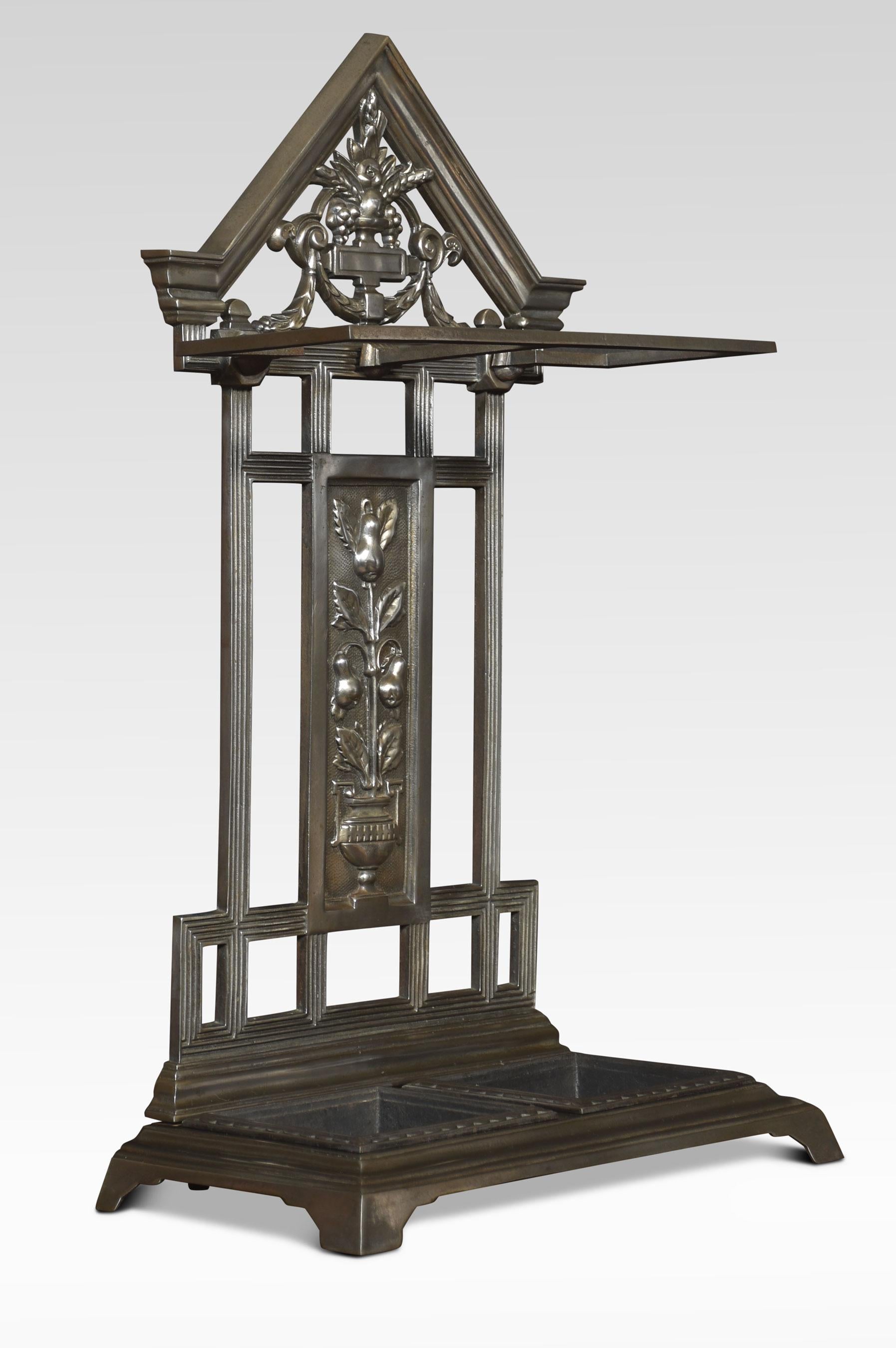 Falkirk cast iron umbrella/stick stand, having an architectural top with flower head and foliated scrolls. The base with a removable drip tin all raised up on plinth base.
Dimensions
Height 31.5 Inches
Width 19 Inches
Depth 10 Inches