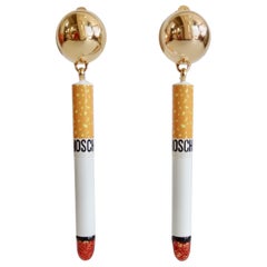 Fall 2016 Moschino "It's Lit" Cigarette Clip Earrings 