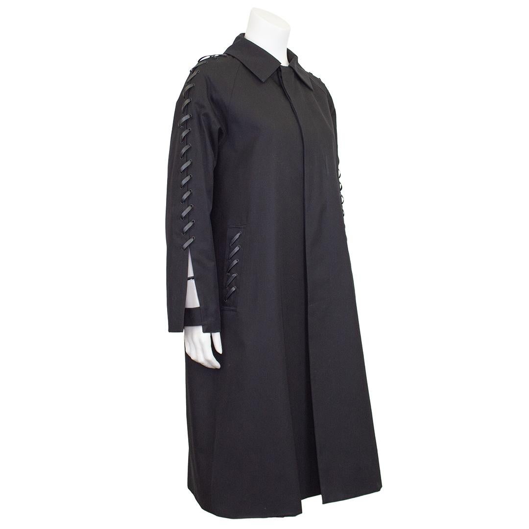 Protege to Rei Kawabuko, Kei Ninomiya launched his own line in Spring 2016. This new spin on an old classic trench is from his second collection; Fall 2016. The trench style coat is meant to be oversized. The incredible detail on this piece is the