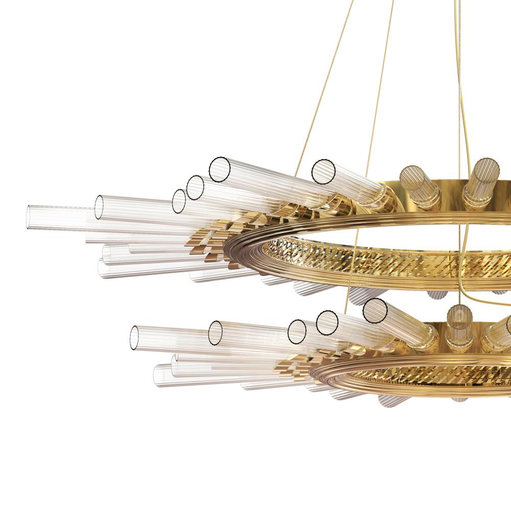 Suspension fall double ring with ribbed crystal glass cylinders
gathered and held by a gold plated polished brass circular structure.
With 60 Bulbs, lamp holder type G9 halogen -40 Watt max. For 220-240V.
Bulbs not included. With adjustable cord
