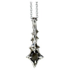 Falling Star (Black Star Sapphire, 18K White Gold Pendant) by Ken Fury
