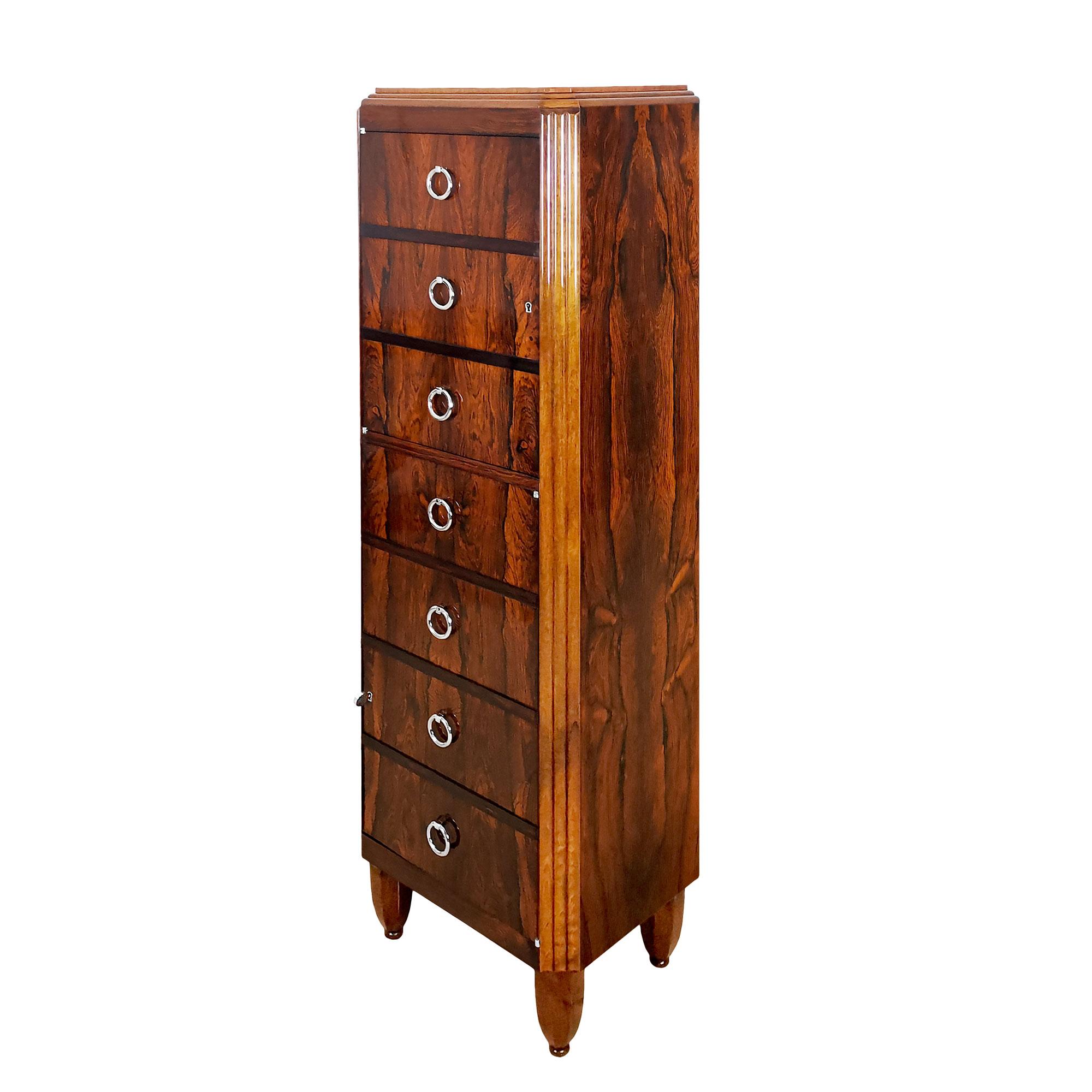 False Art Deco “semainier” with two doors (instead of drawers), structure in solid oak veneered with walnut, fluted uprights and feet in solid walnut. Oak interior. Nickel-plated brass handles and fittings. French polish. High quality.

France,