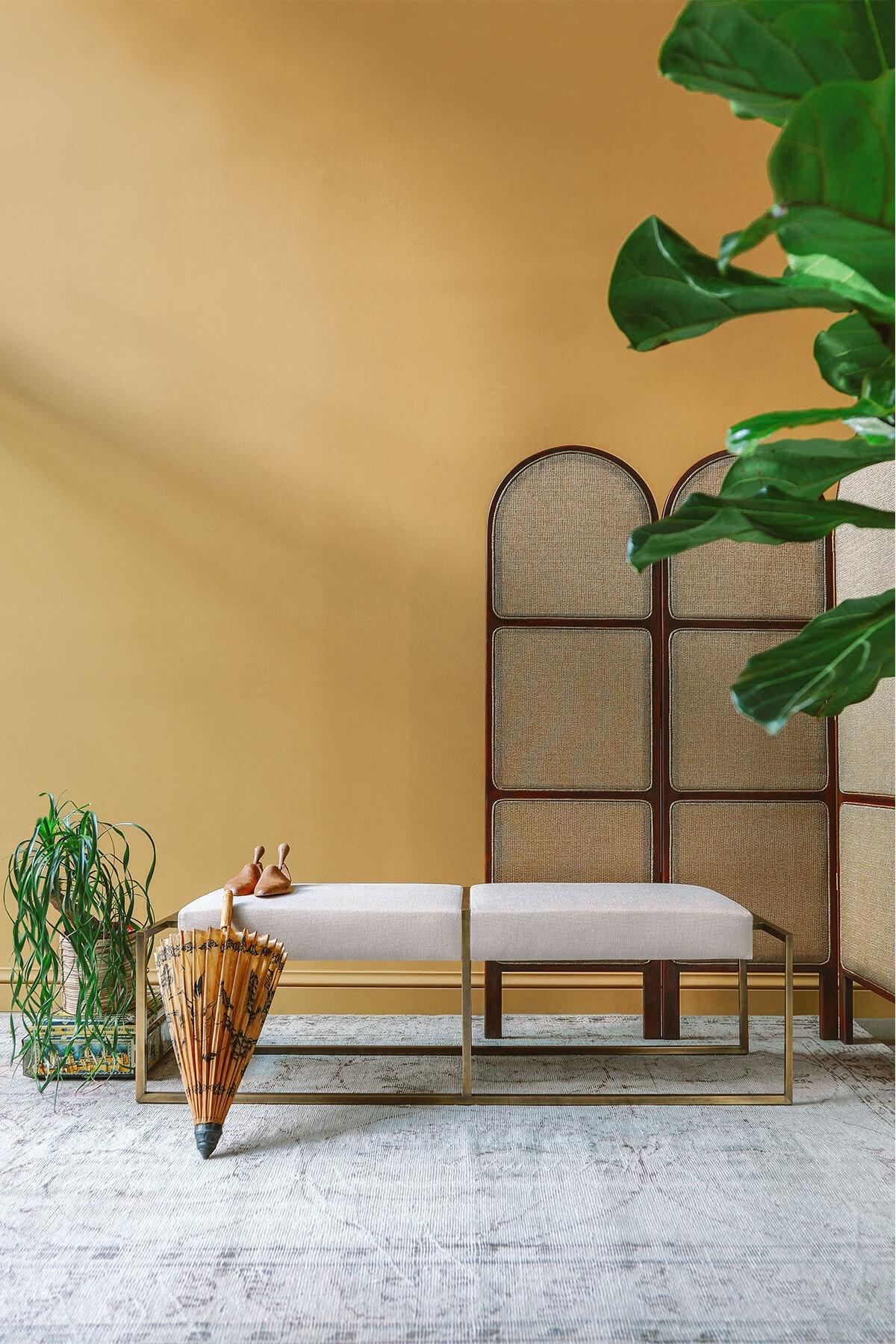 The FAMED BENCH...harmoniously combines brass and fabric brining a refined elegance and comfort to your home.

 Length: 59.1'' / Depth: 17.7'' / Height: 18.5''

-Brass
-Registered Design.

BRASS USE AND CARE
Clean surfaces with a dry cloth.
Minimize