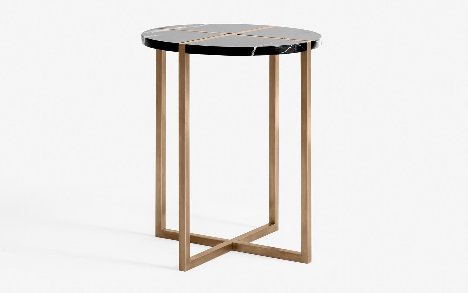 The Famed side table designed as a flawless intersection of marble and brass...

Measures: diameter: 17.7'' / height: 21.3''
Weight: 11.8 kg

-Alexander black marble
-Brass plated metal
-Registered design 

Alternatives:
carrara white marble /
