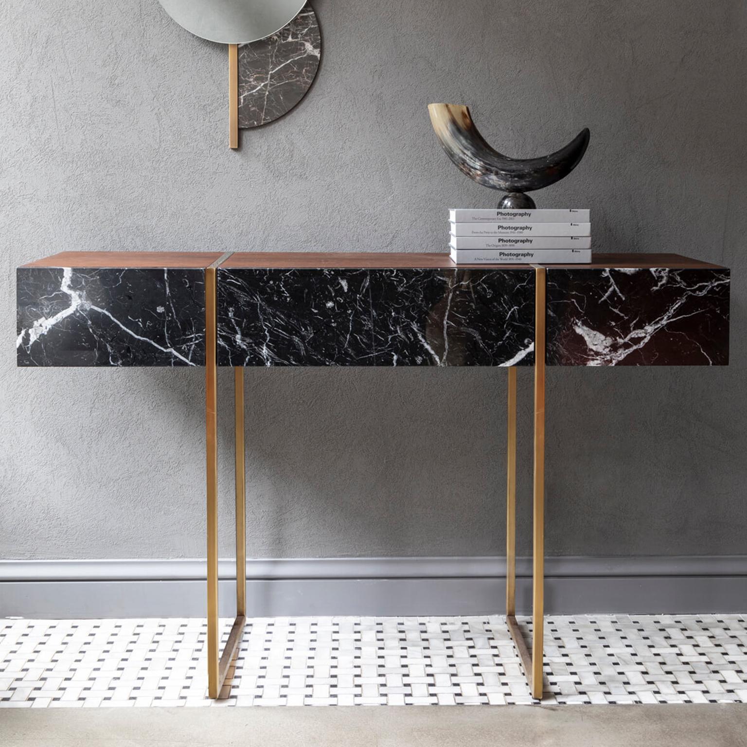 Famed Marble Detailed Sideboard by Lagu.
Designed by Ufuk Ceylan.
Dimensions: W 144 x D 45 x H 90 cm.
Materials: Marble, Metal, Oak.

The famed sideboard is encased in Alexander Black marble highlighted with brass accents, incorporating a