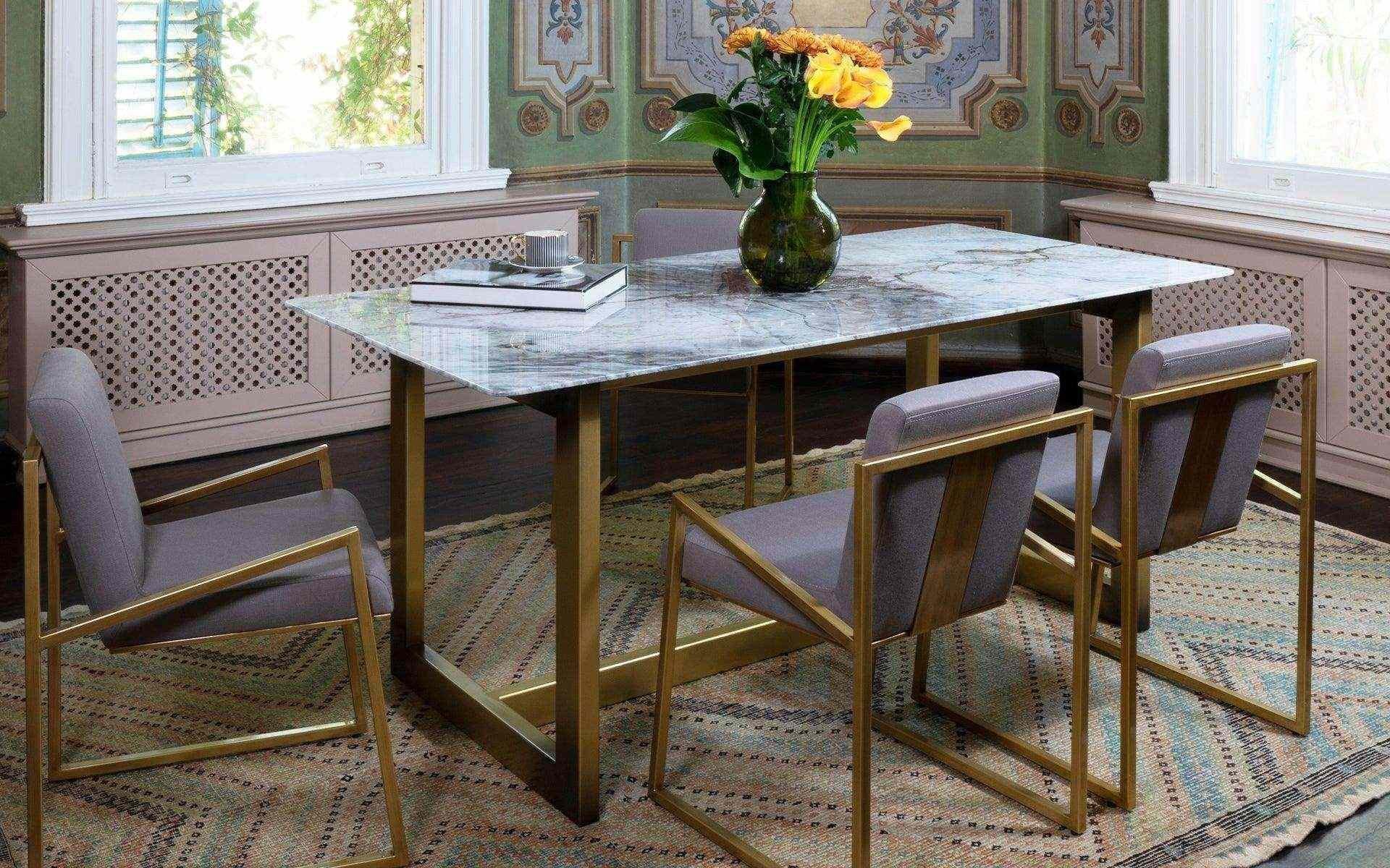 A complete complement to the rubik cube design with their chairs, the FAMED table will take the lead in your dining area. The model, which will be the address of your comfortable and rude dishes, will create a full image with its brass-detailed feet