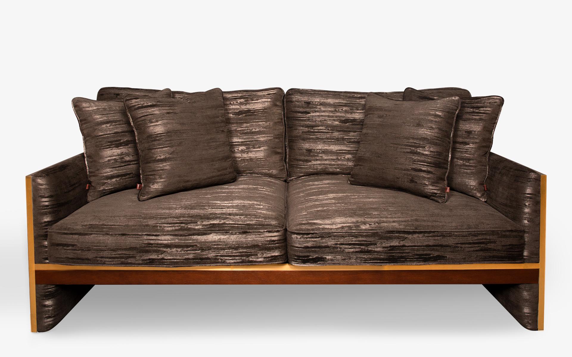 The famed two seater sofa harmoniously combines fabric with brass adding an impressionable air of quality to your space...

Materials:
-Brass 
-First grade alder
-First grade oak veneer
-Registered Design

Alternatives:
-Brass / Matt Chrome / black