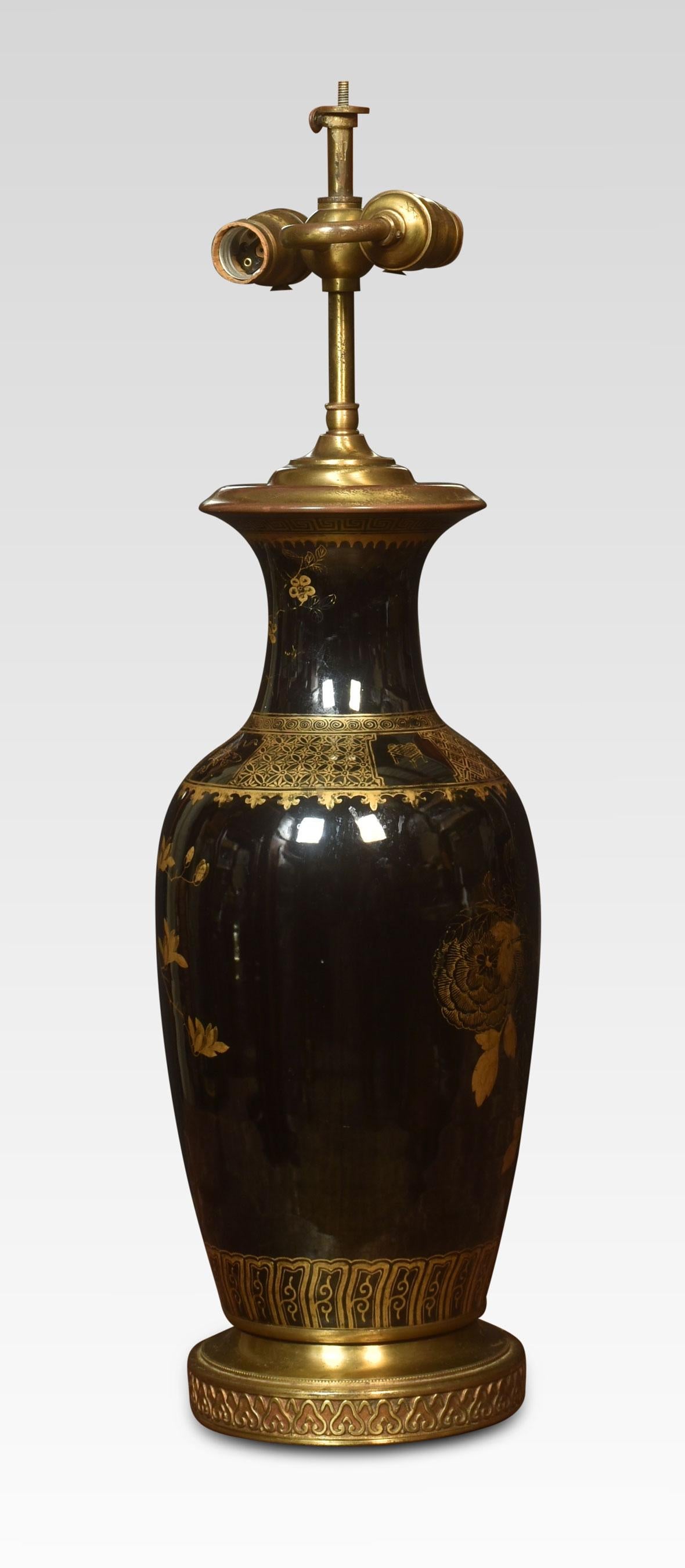 Famille Noire baluster vase lamp with gilded detail on black background. Raised up on circular base.
Dimensions
Height 26 inches
Width 7.5 inches
Depth 7.5 inches.