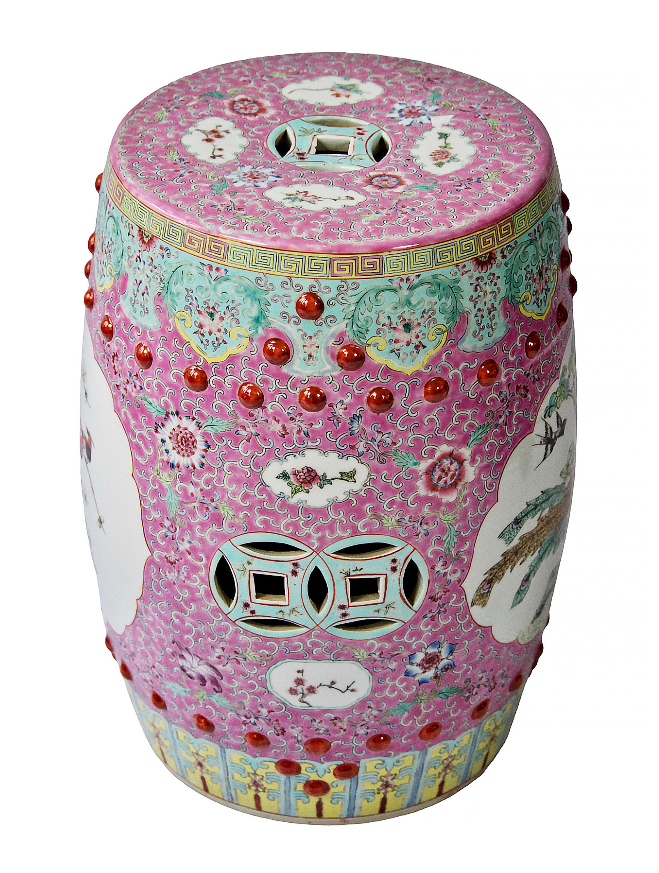 Chinese ceramic Famille Rose garden stool with openwork also with glazed circumferential decoration of the floral elements and birds.