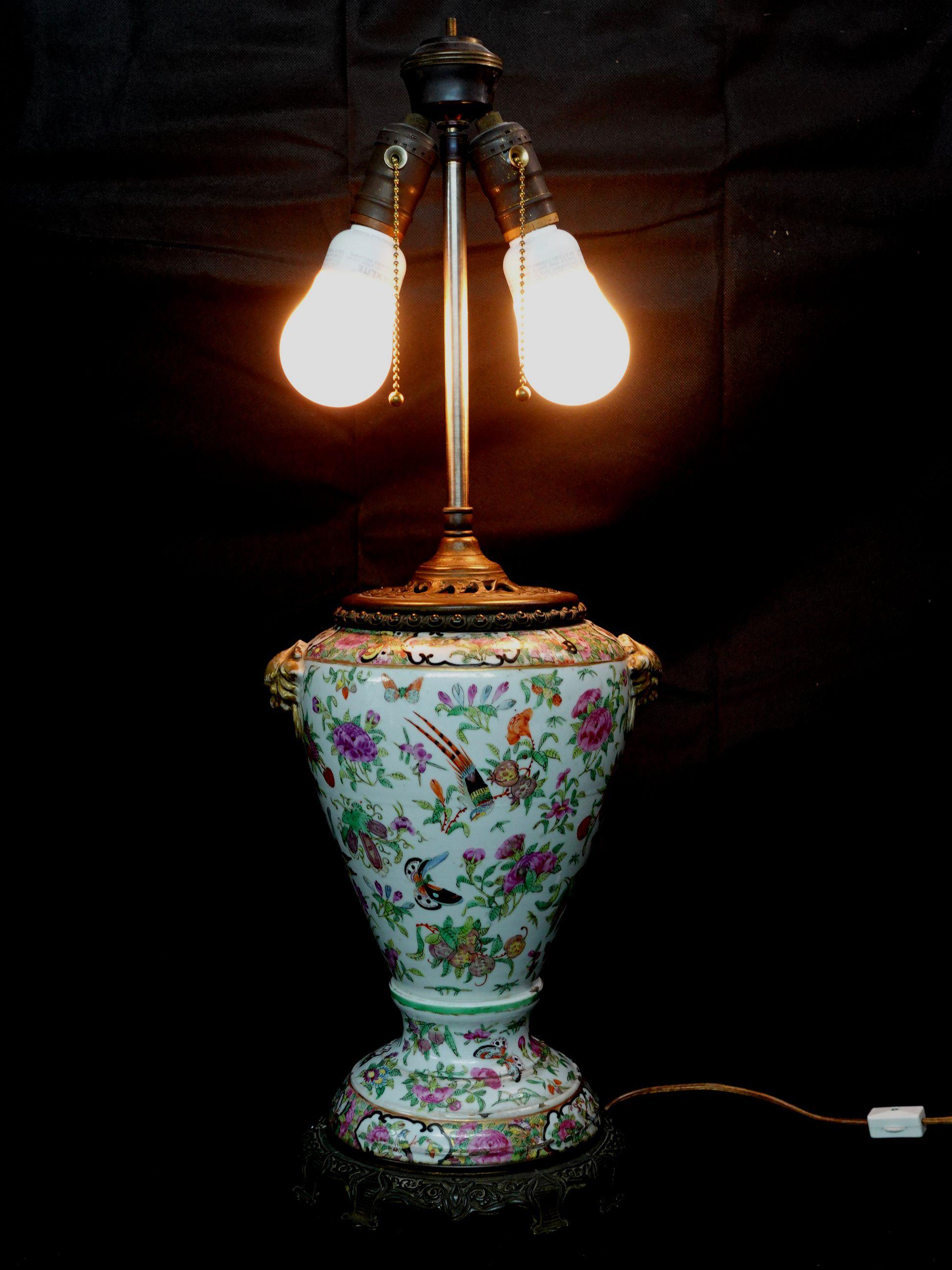 Famillie Rose Export porcelain lamp, China, 19th century, converted from a vase into an electric lamp, mounted on the bronze on both top and the bottom stand.
Measures: height 25 1/2, vase height. 13, diameter 7 1/2 in.


 