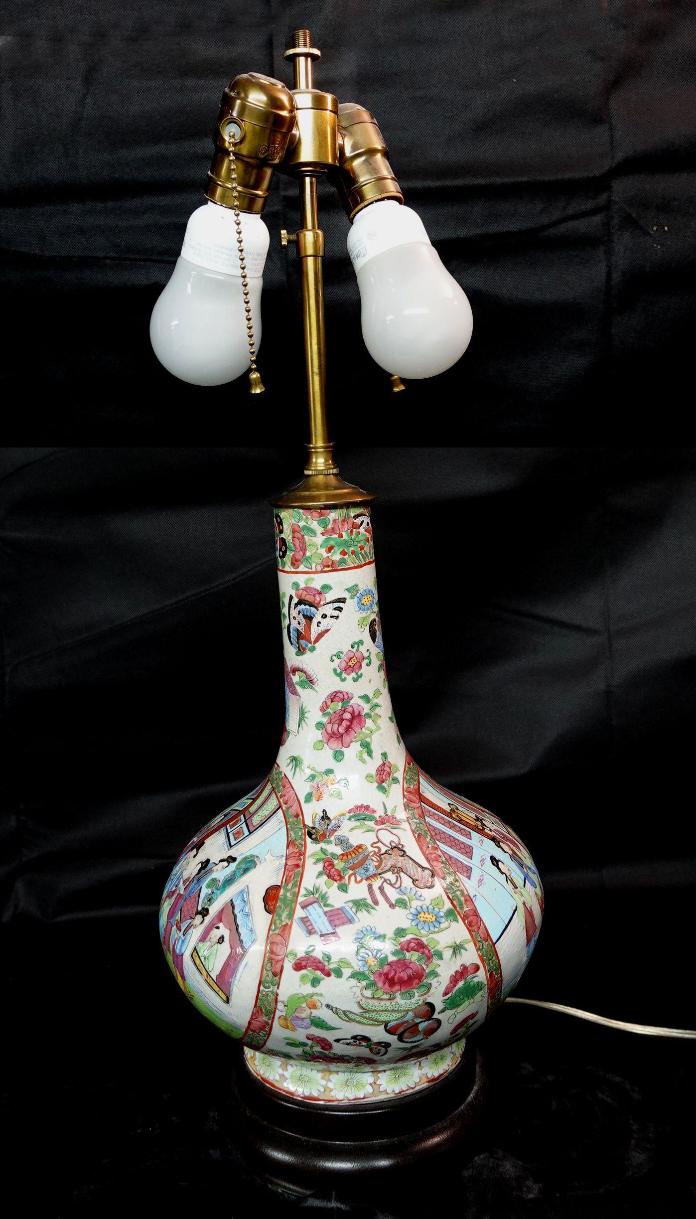 Famille Rose Export porcelain water bottle converted to a lamp, China, early 19th century, bottle ht. 13 in.
total ht. 24.5