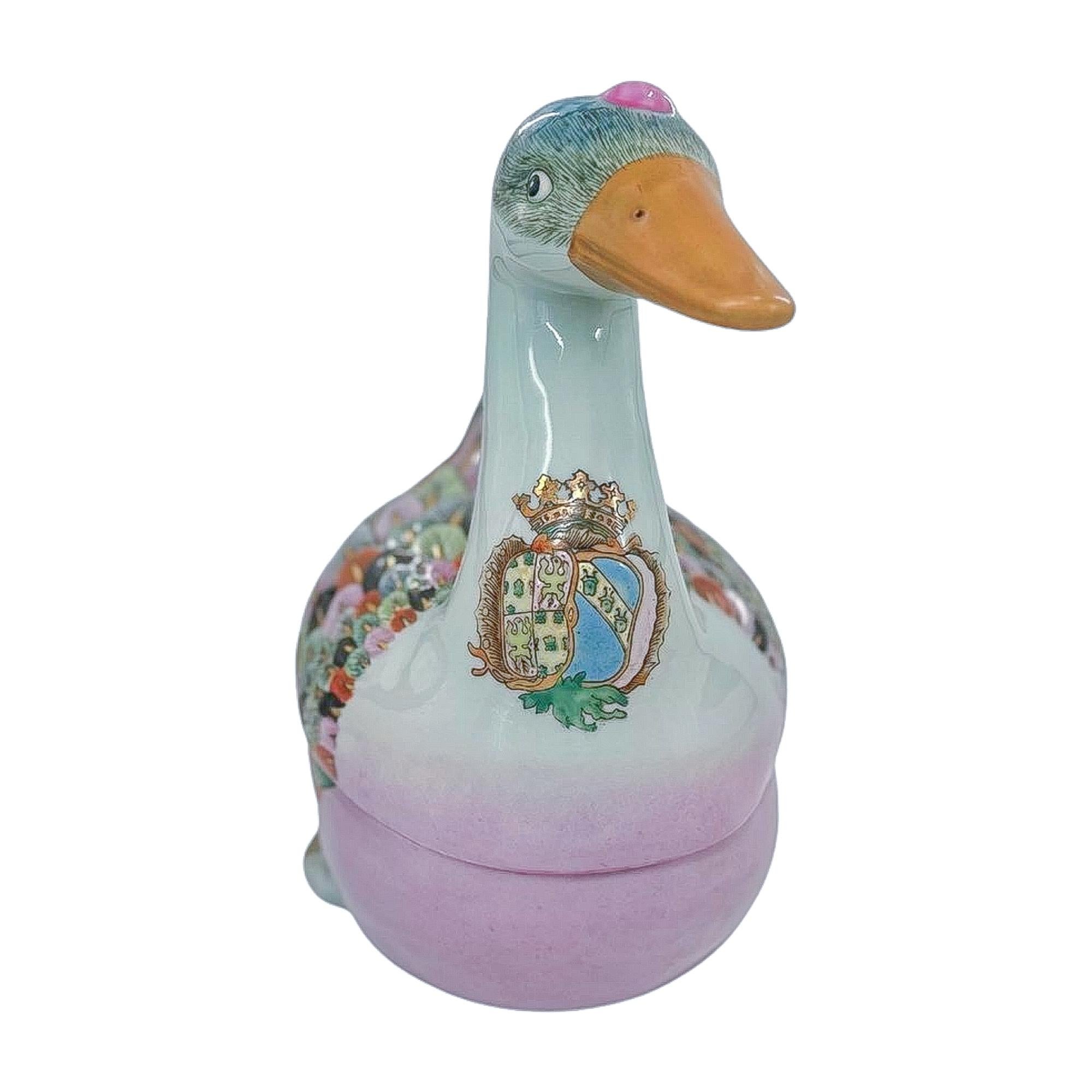 A striking mid-20th century Chinese Export famille rose porcelain tureen, beautifully modeled in the form of a plump goose with softly graduated pink, celadon, and apricot plumage. The body and feathered wings are richly hand-painted in famille rose