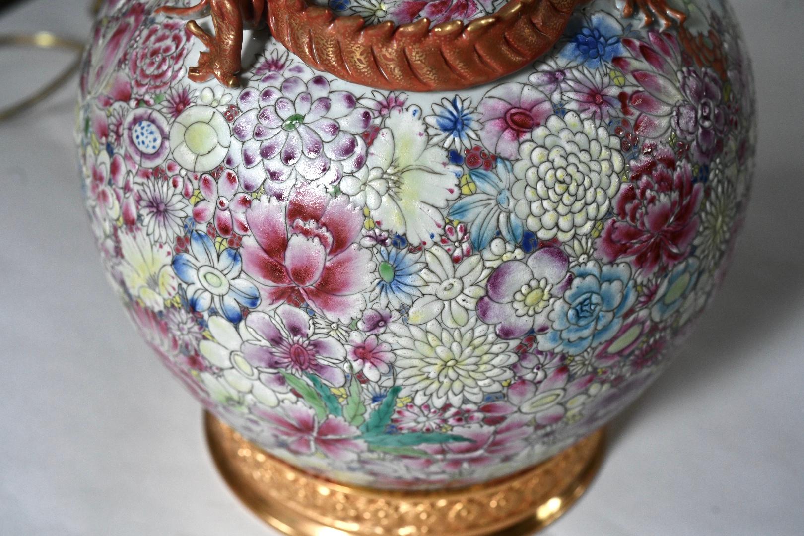 Pair of Famille rose porcelain lamps with flower blossoms and dragon decoration.
To the top of porcelain: 19
