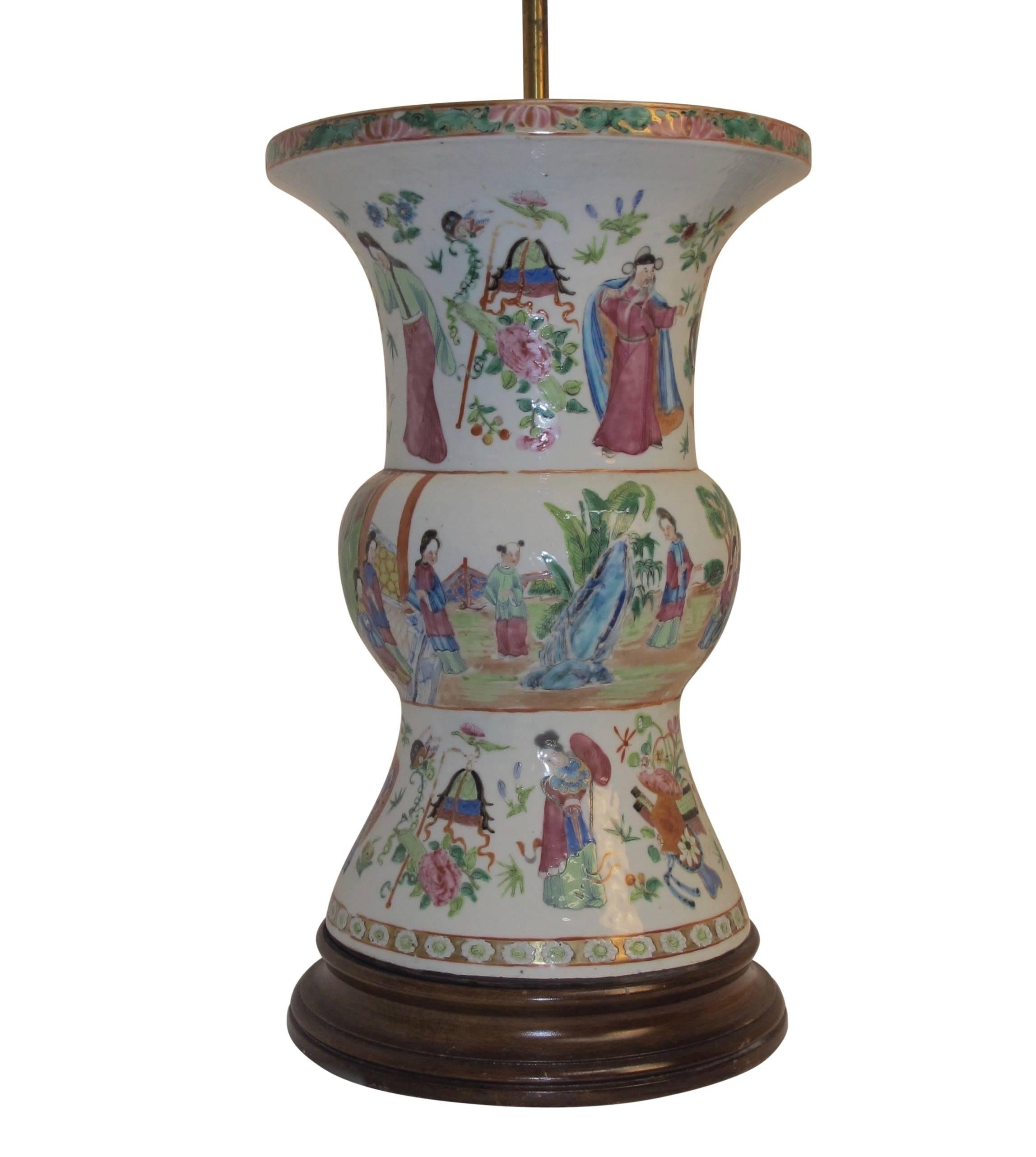A famille rose pattern vase with hand painted figures, converted to a table lamp, China, mid-19th century.
Shade not included.