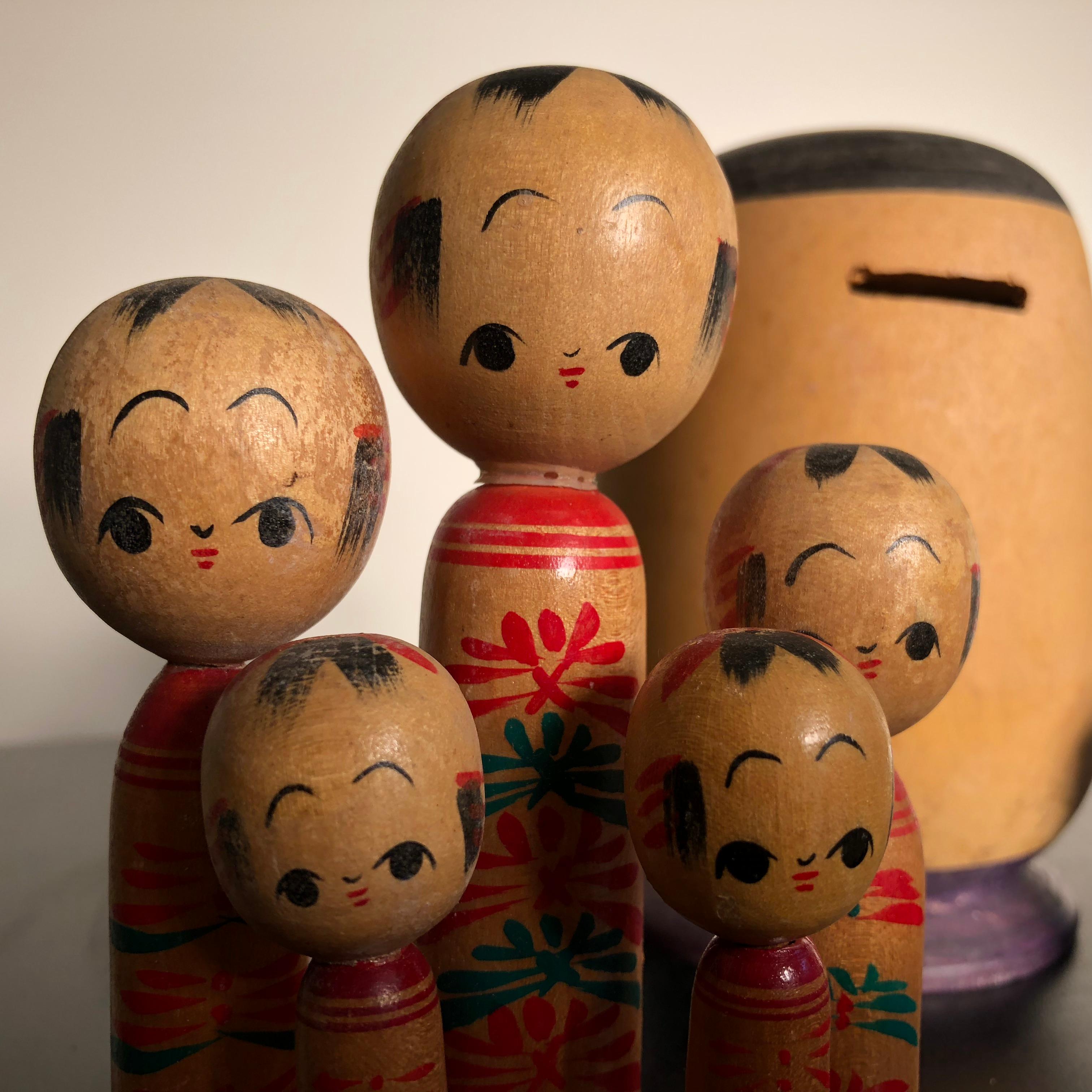 Wood Family Eight Old Japanese Famous Kokeshi Dolls, All Hand Painted and Signed