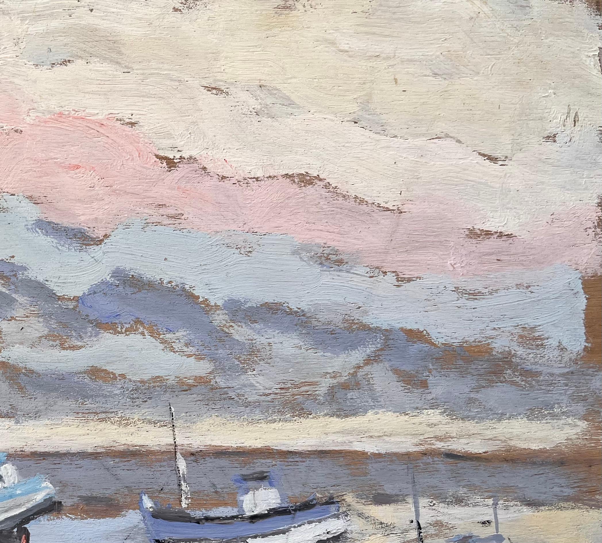 Iglesia costera y barcos de pesca a la luz de la mañana con cielo rosa en venta 1