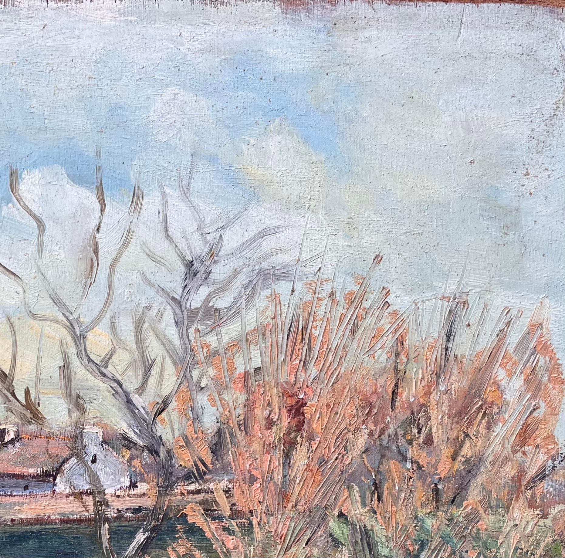 Title: French Countryside Landscape Oil of Farmhouse Path and Pollarded Trees by River
By Fanch Lel
Size: 13.25 x 15.75 inches (height x width)
Oil painting on board, unframed
Condition: The painting is in good condition with minor signs of wear and